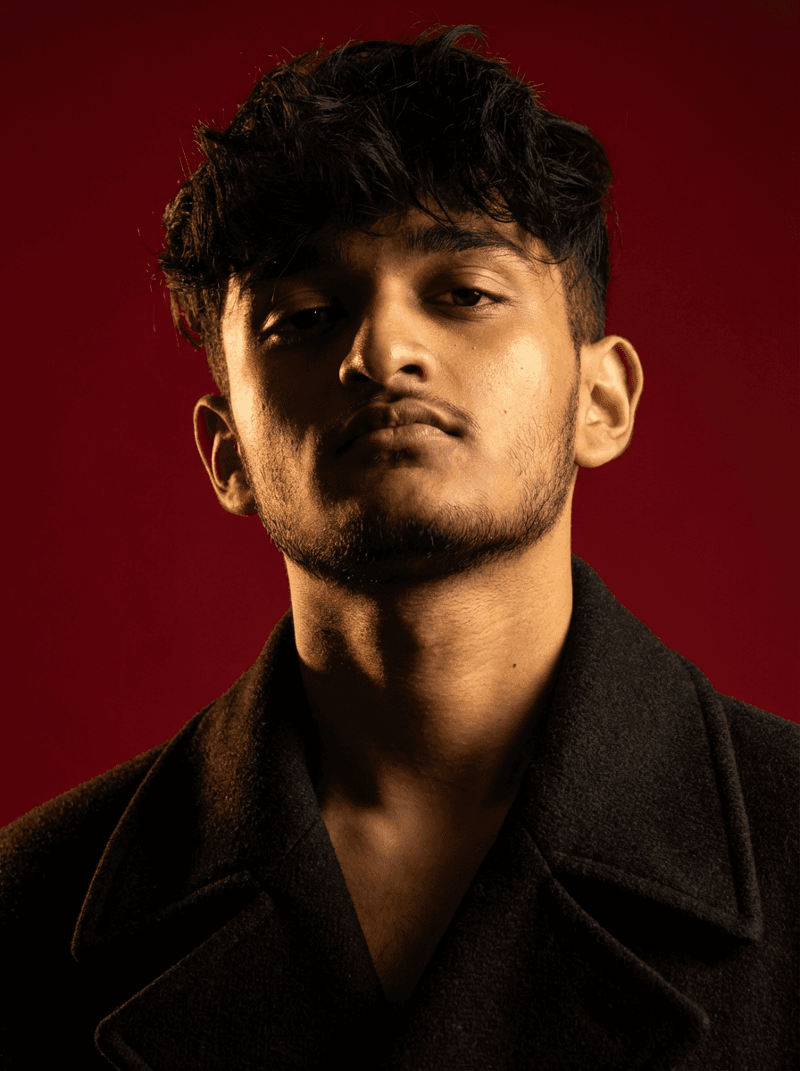 man standing beside wall