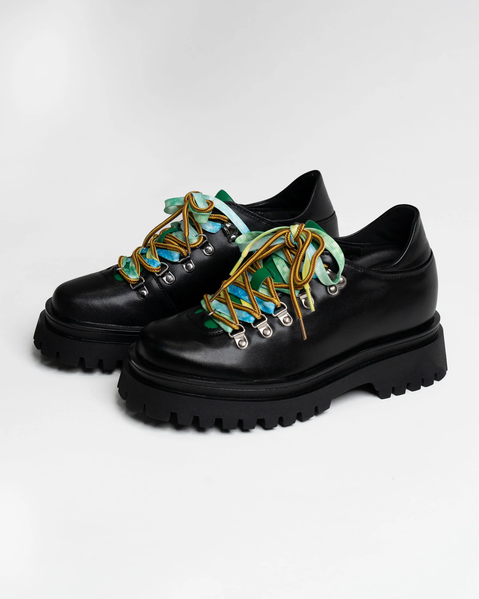 person writing on a piece of paper 