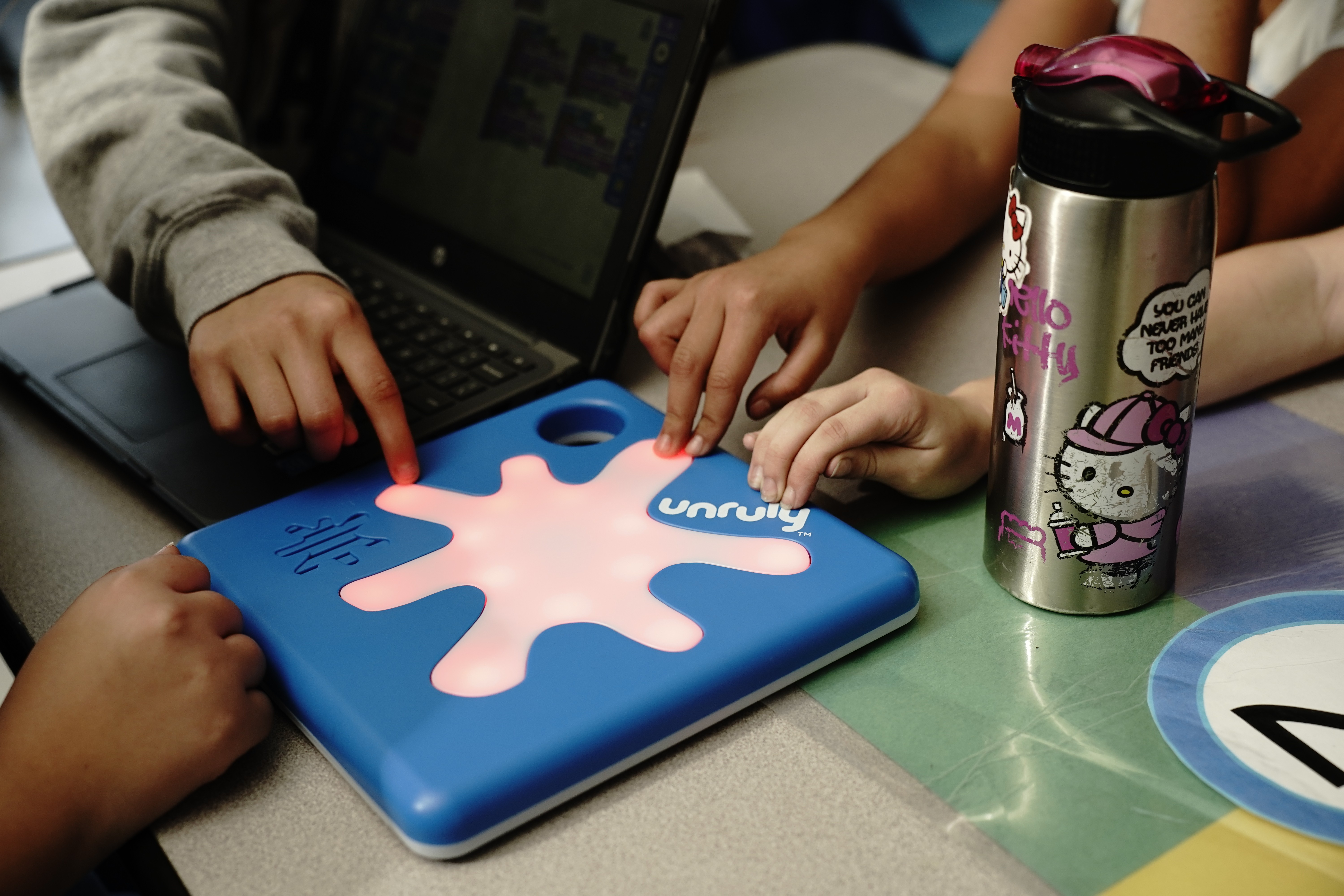 students learning strategy and critical thinking during a chess enrichment class with a HOKALI instructor