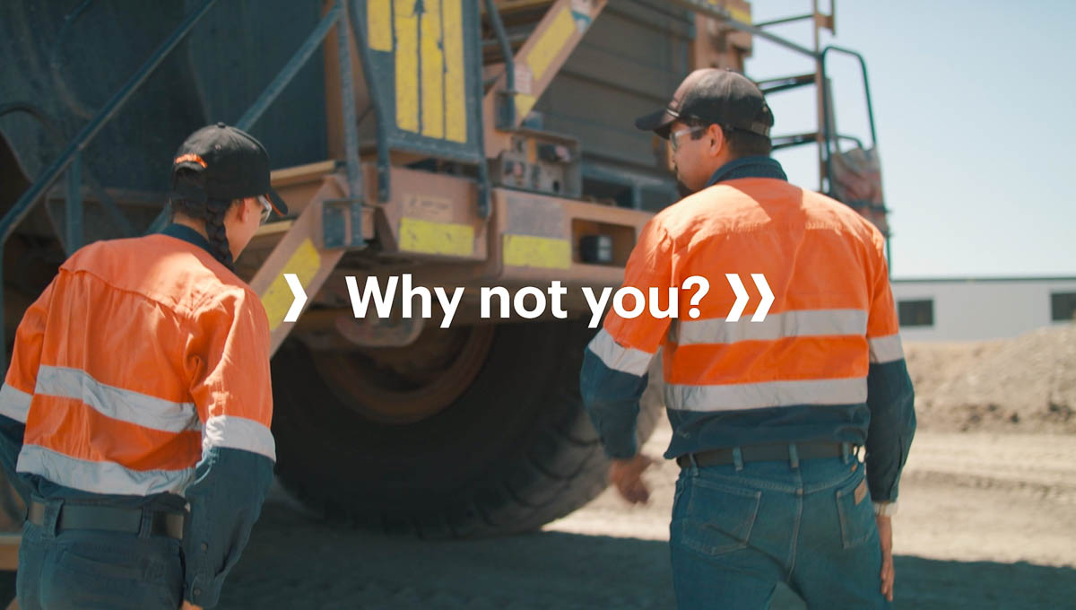 BHP worker in hi-vis PPE with vehicle tyre on site - Why Not You campaign