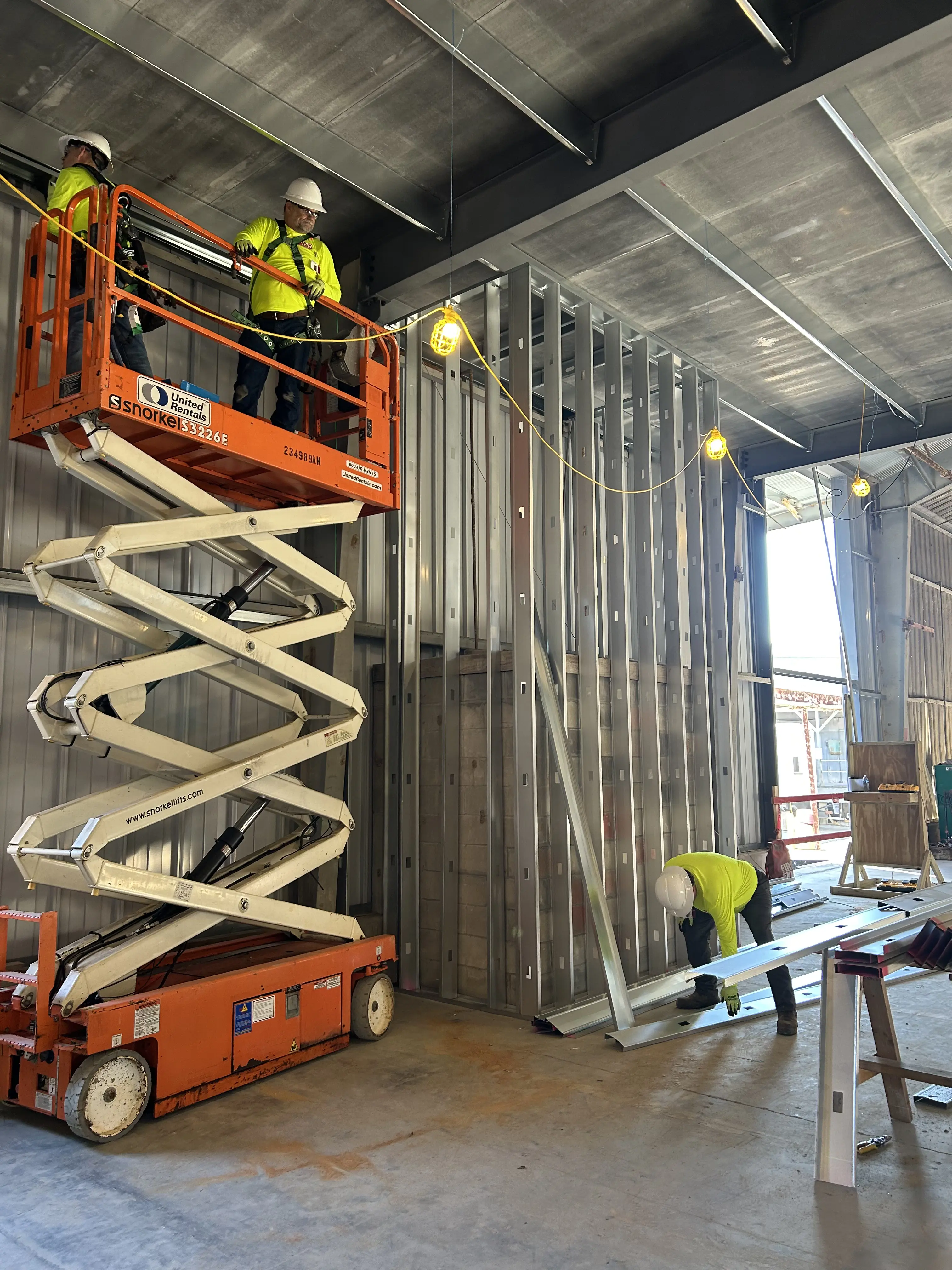 a couple of men standing next to each other