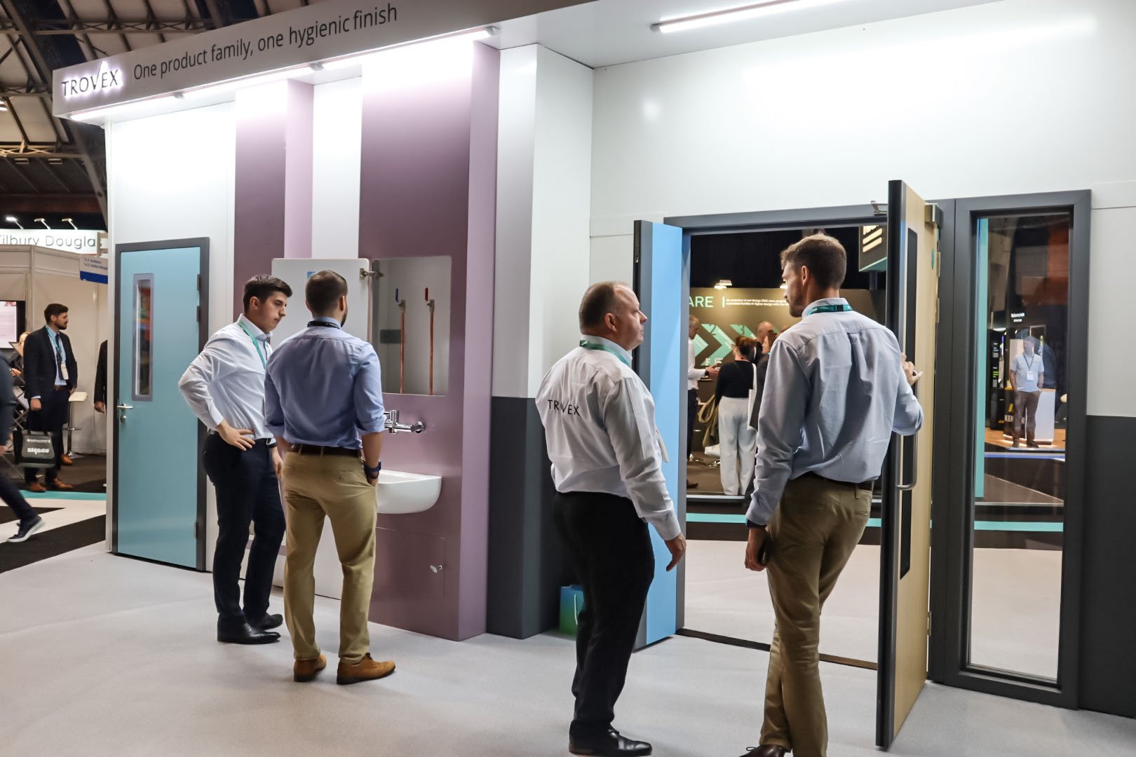 The Trovex team showcasing the Hygipod IPS and Hygidoor to customers