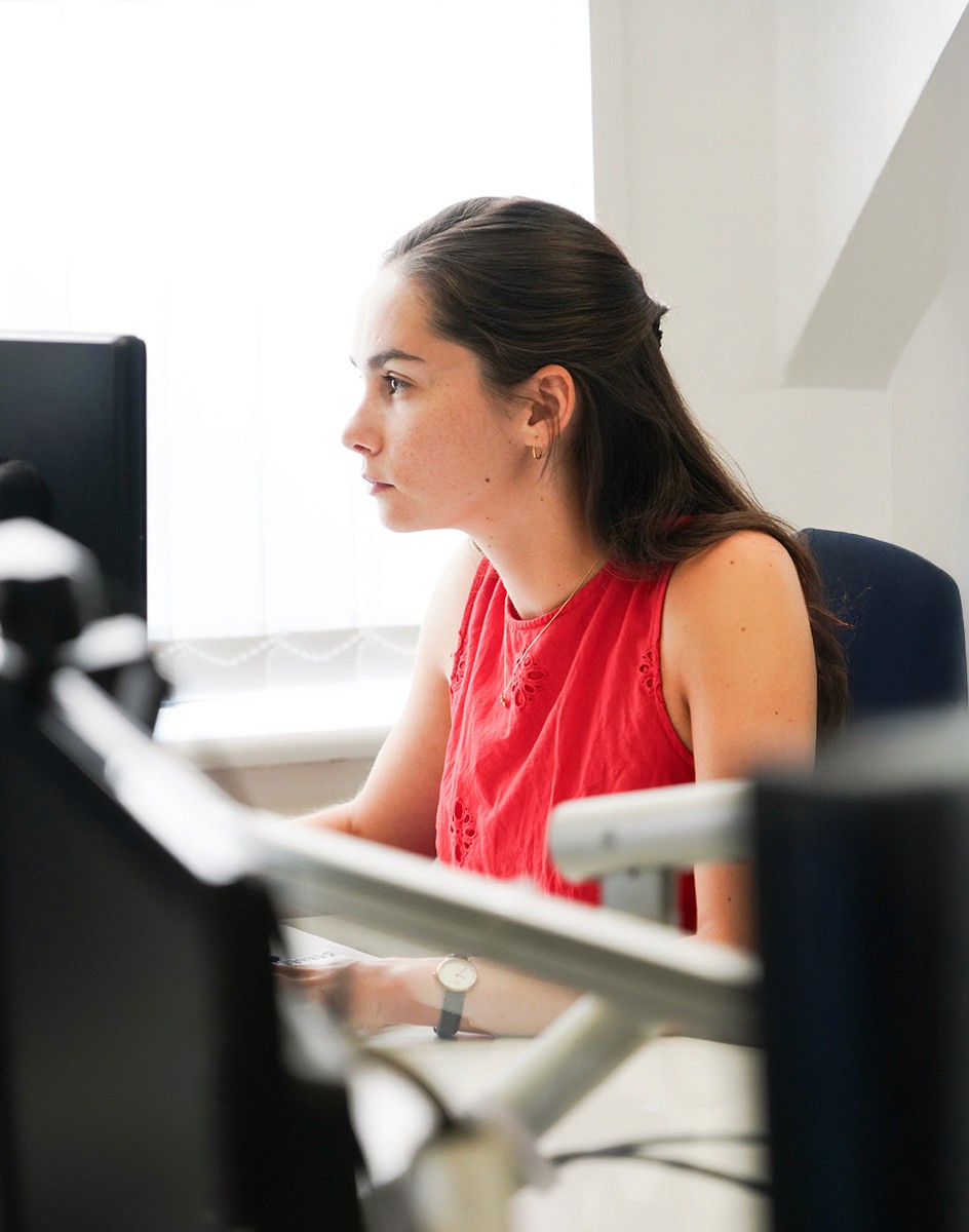Composite image of the Hughes Price Walker pension support team working in the office.