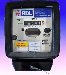Consumer unit with circuit breakers used to calculate maximum electrical demand for a UK heat pump installation