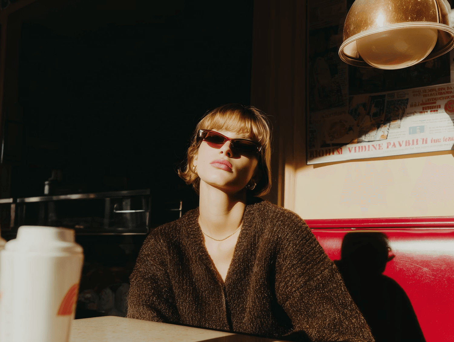 A stylish individual in sunglasses