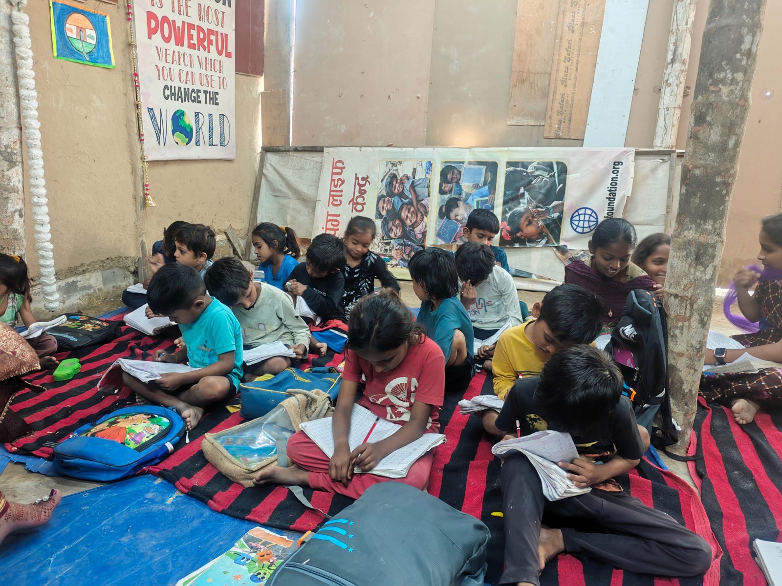 2 boys and girl playing soccer during daytime