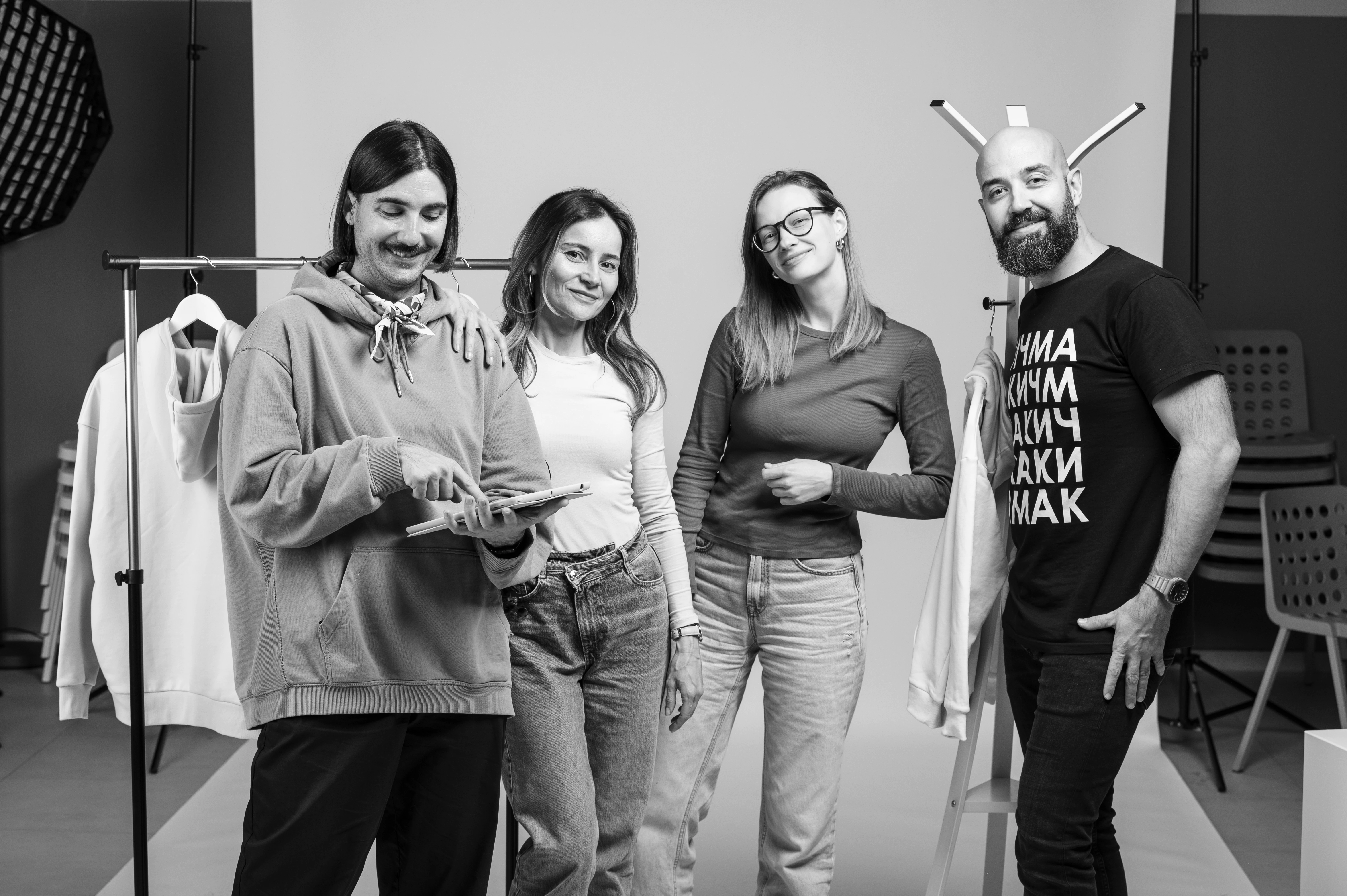 A smiling and bit tired team at the end of a successfully completed photo session