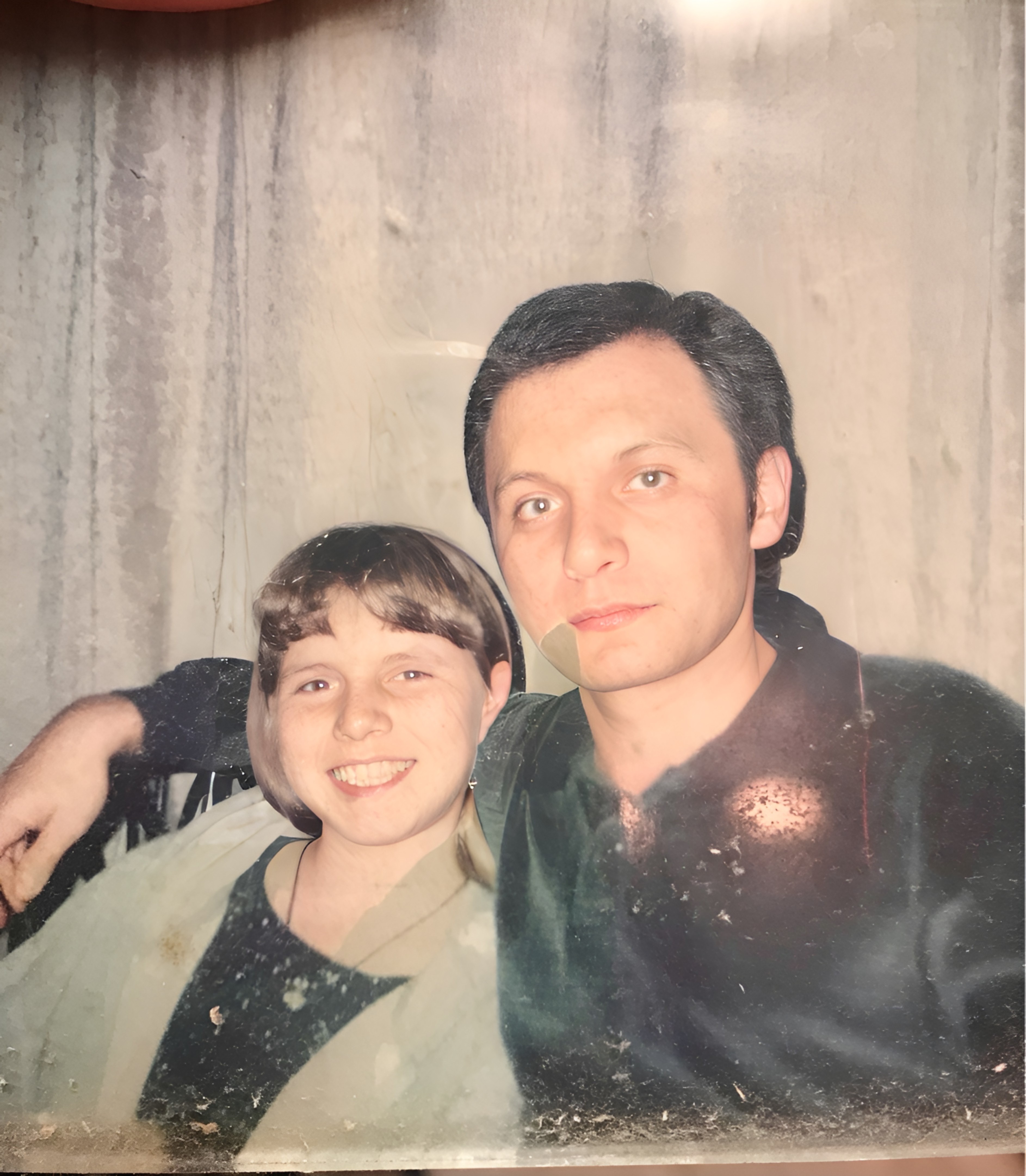 a woman with her hair in a bun