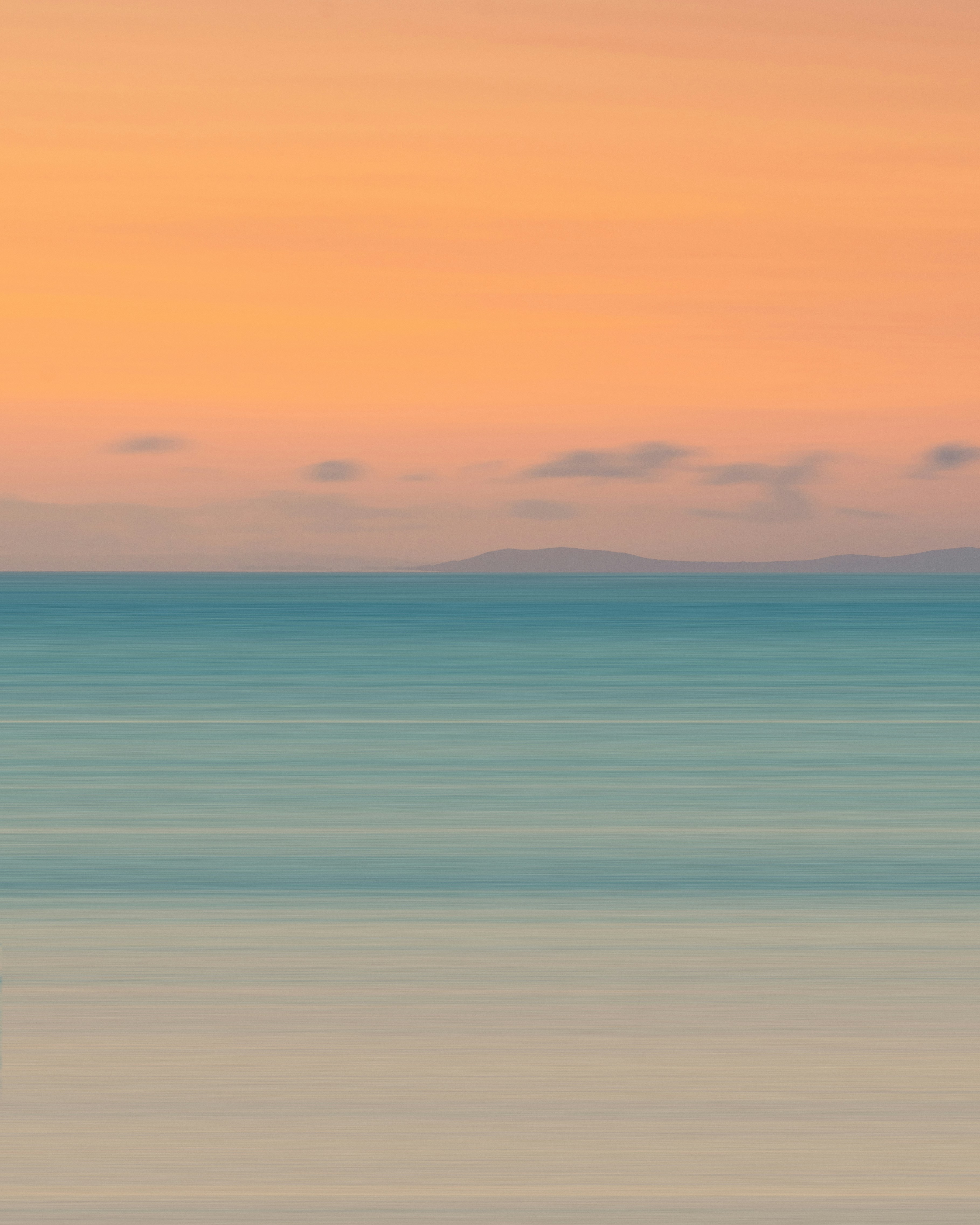 blue and orange sky over the sea