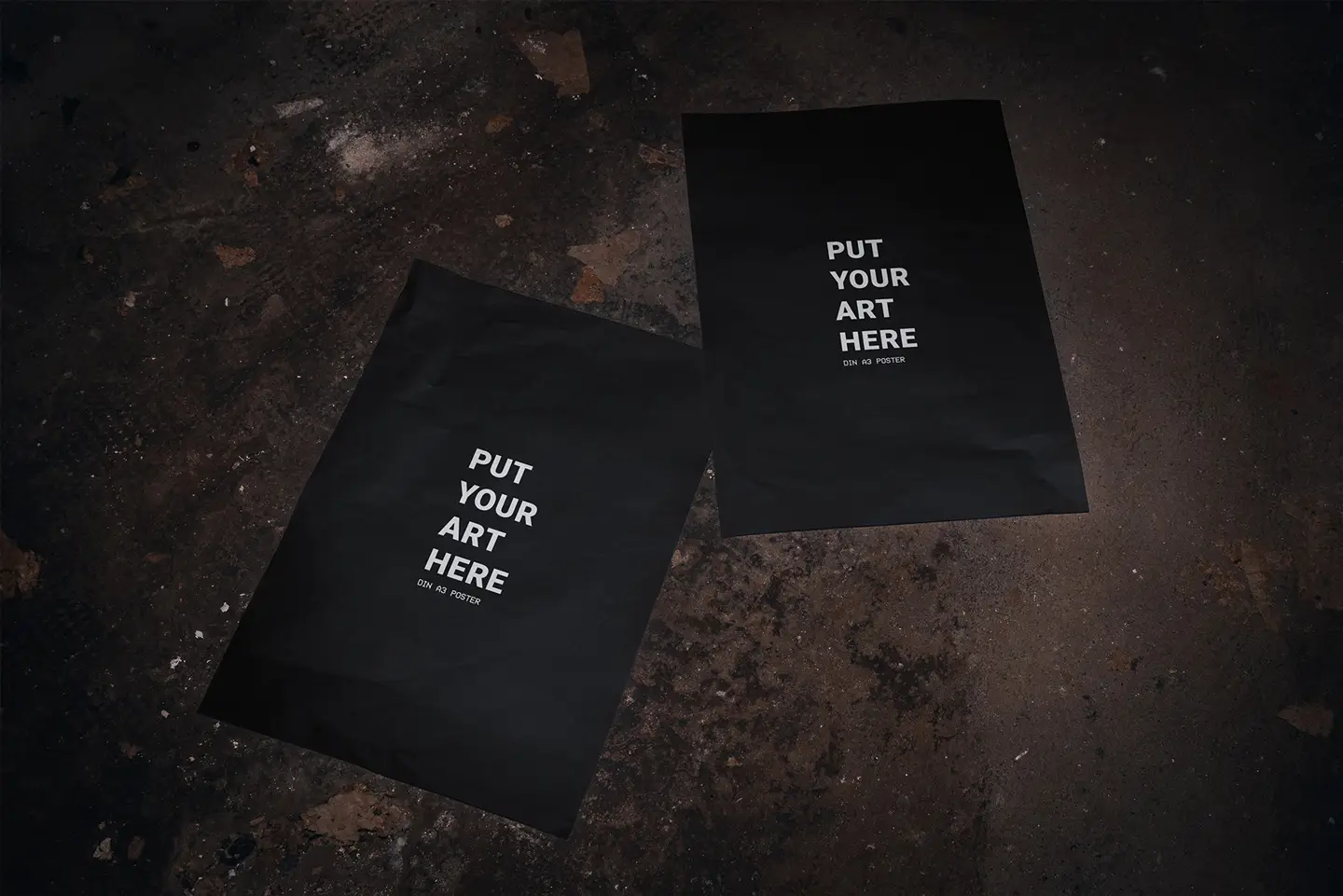 Basement A3 poster mockup showing two blank posters placed on gritty floor