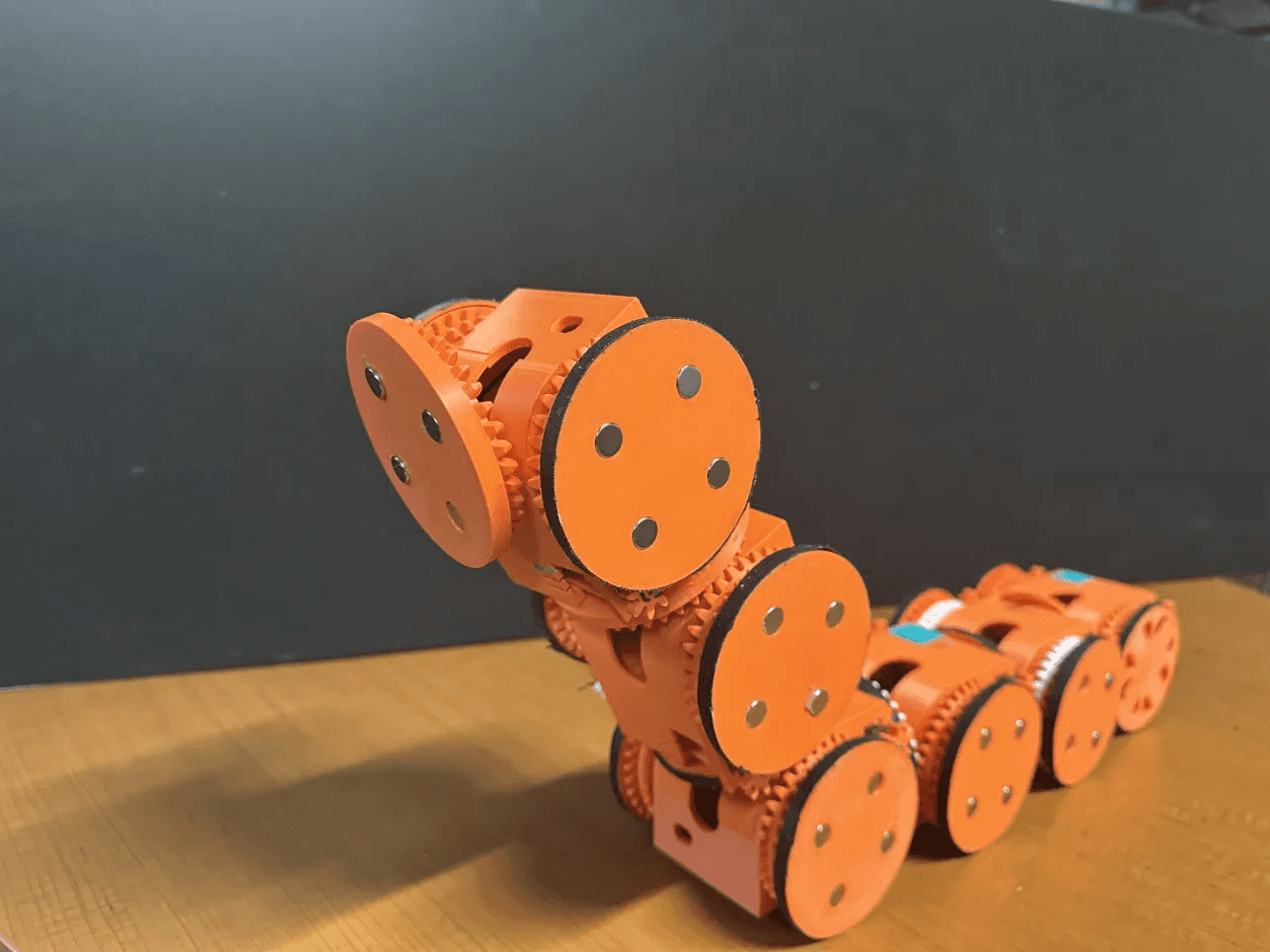 Six swarm bots connected to form a structure
