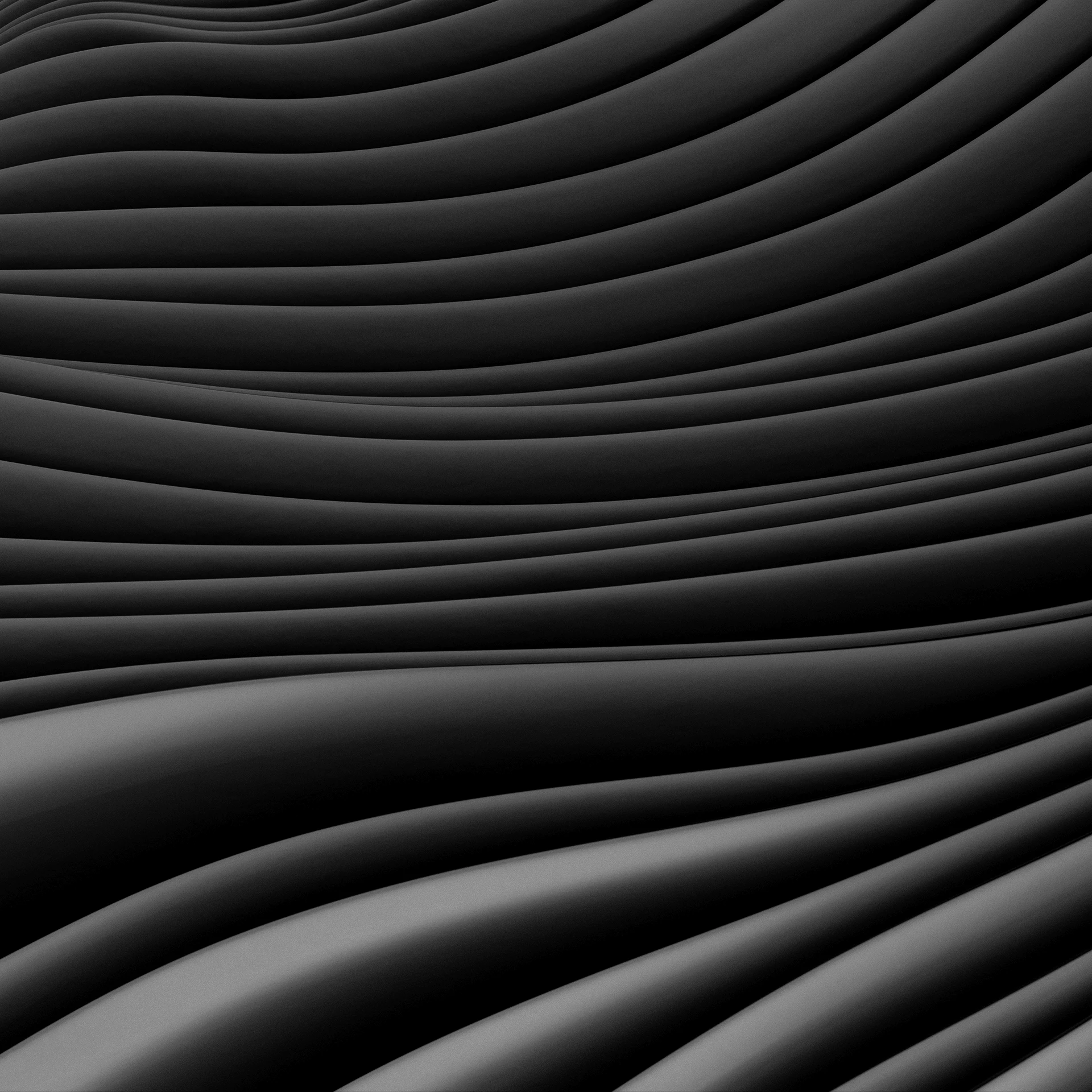 Abstract flowing waves in grayscale creating a smooth, undulating pattern with light and shadow gradients