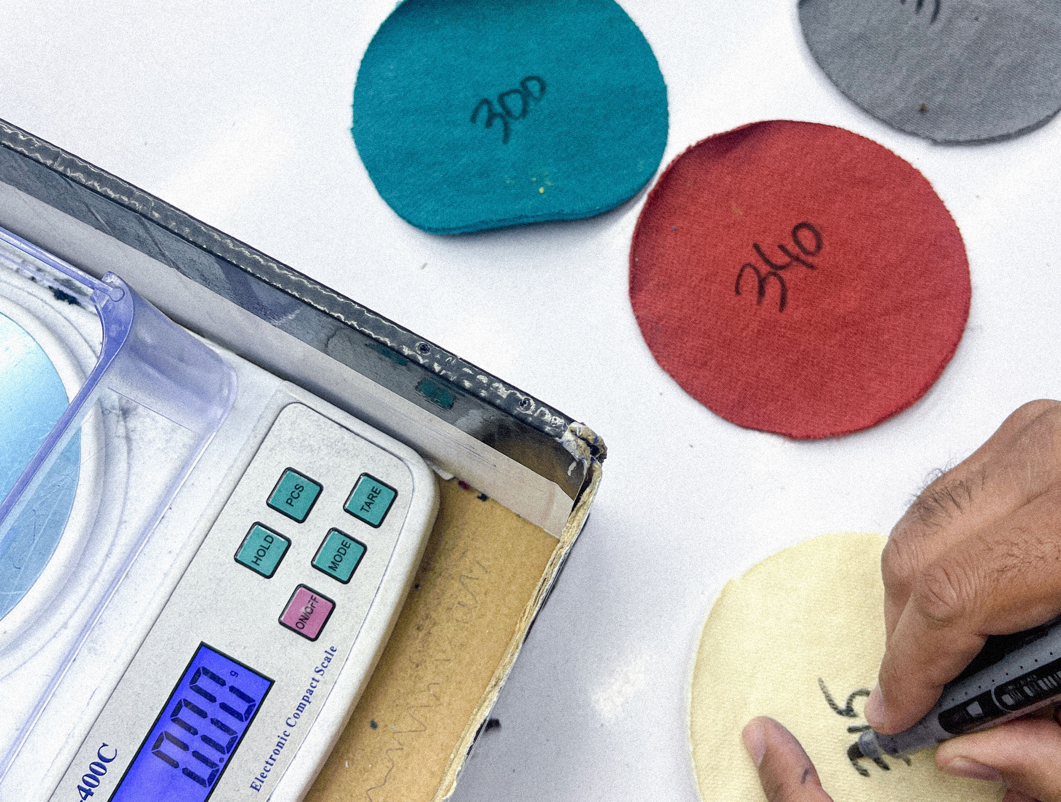 Detail shot: cotton fabric GSM weight check