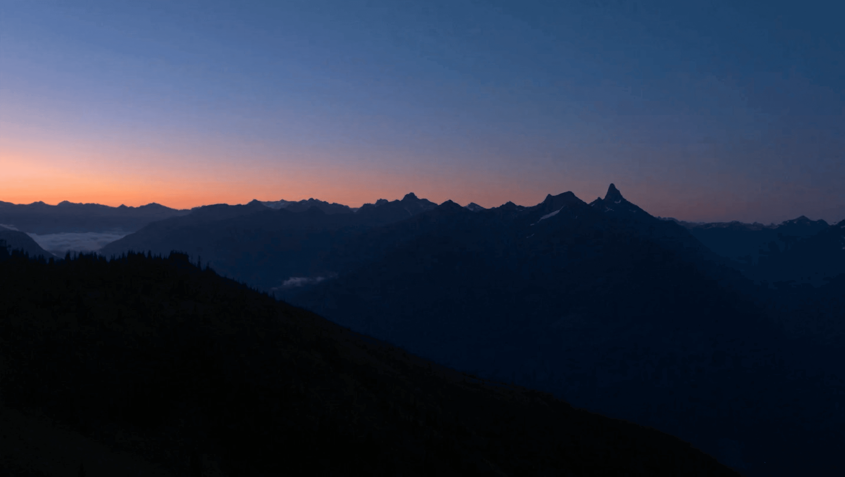 Drone imagery of an early sun ride in the mountains. Aspirational imagery for brand anthems.