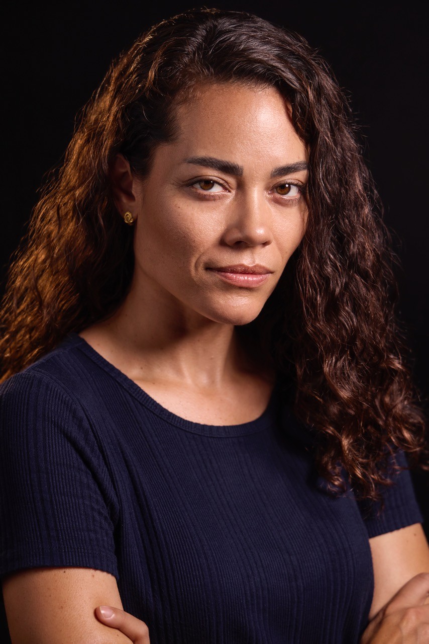 Profile card of Shannon Holloway including headshot and company logos