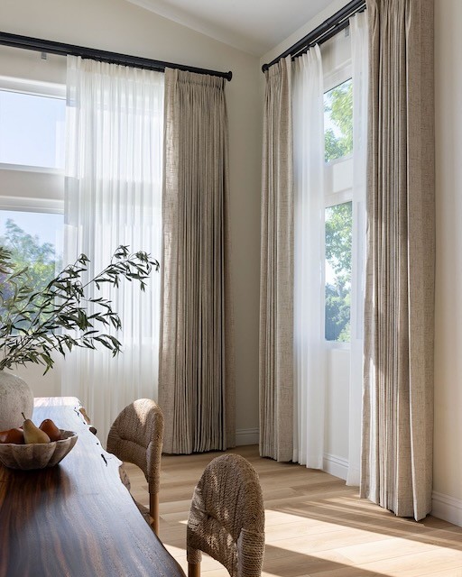 drapery installed in Houston, Texas living room with cream color and sheer back