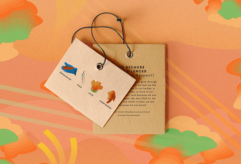 A light brown tag with black string is attached to a peach-colored background featuring abstract orange and green cloud-like shapes. The tag displays three illustrated symbols: a blue shape labeled “DEPRESSION,” a wavy green shape labeled “FEAR,” and a brown shape labeled “LOVE.” Text on the tag reads “AND BECAUSE SILENCED & Respect.” Below the tag, a message reads: “We’re gone through so much because we feel we did — a voice to our silences, a loudness because we are — Loud to be heard. We are Loud to heal, we are — because we are proud.” #solo1 #loudbeautifulswallowed #recognitionandrespect