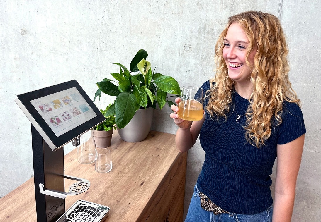 Woman at the Drink Dispenser