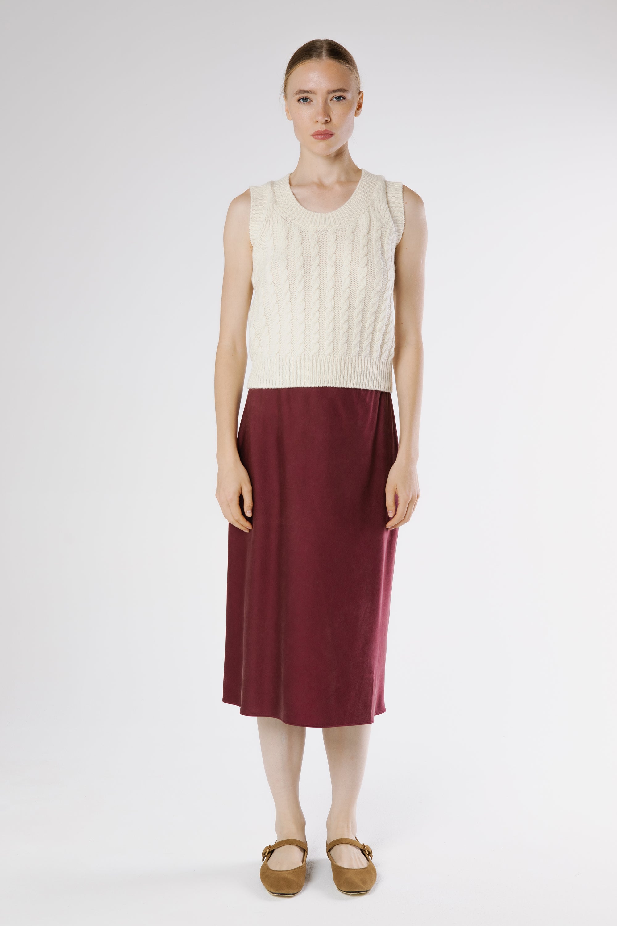 Front view of Bella Cashmere Top Lapponia in soft cream Italian cashmere with refined cable knit texture.