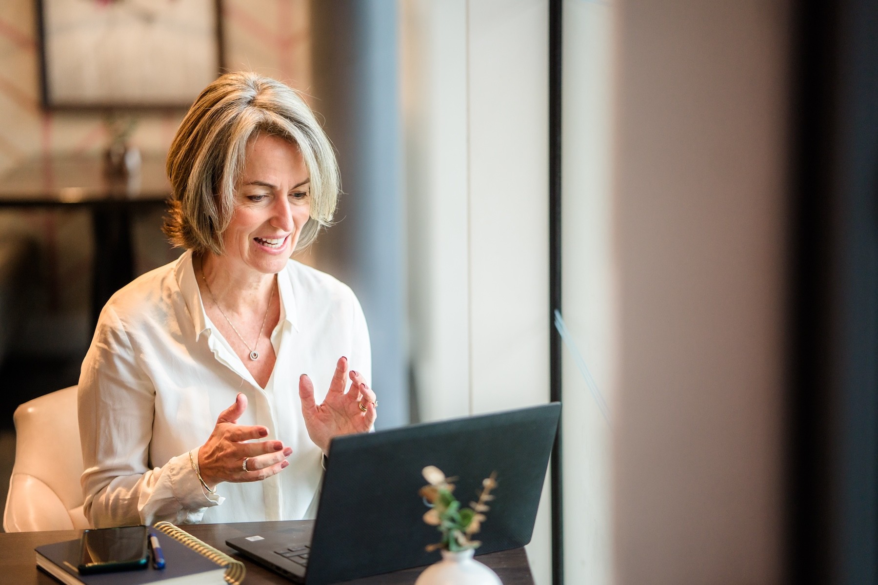 Kate outside with her hands crossed