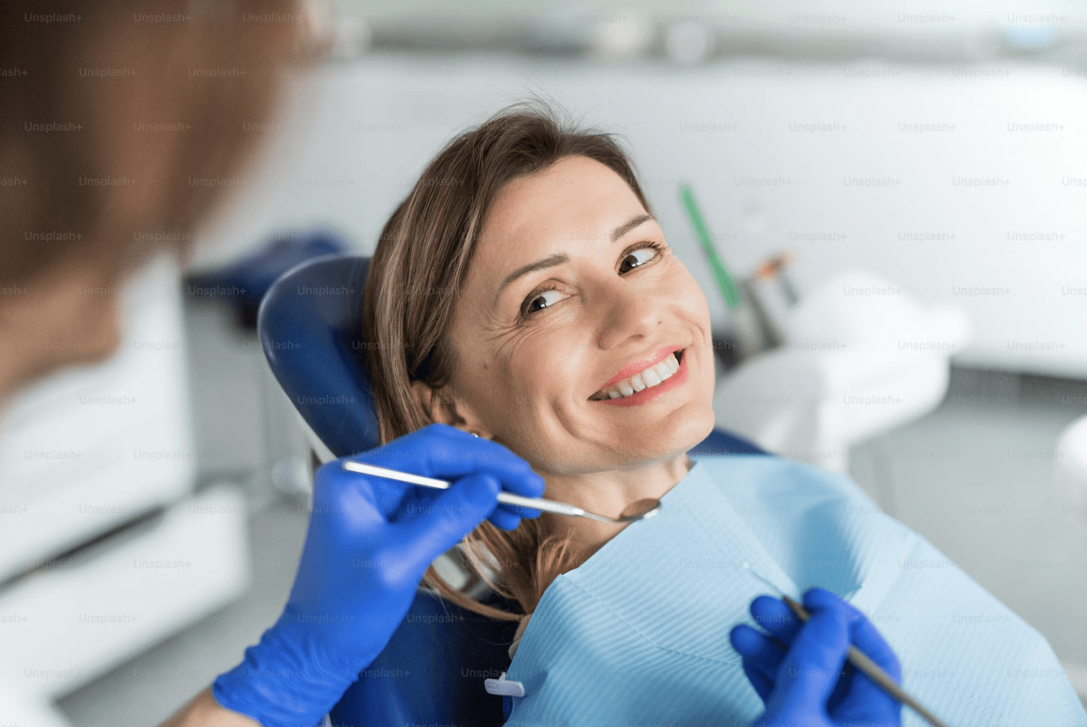 Professional teeth cleaning performed by a dentist during an oral hygiene appointment