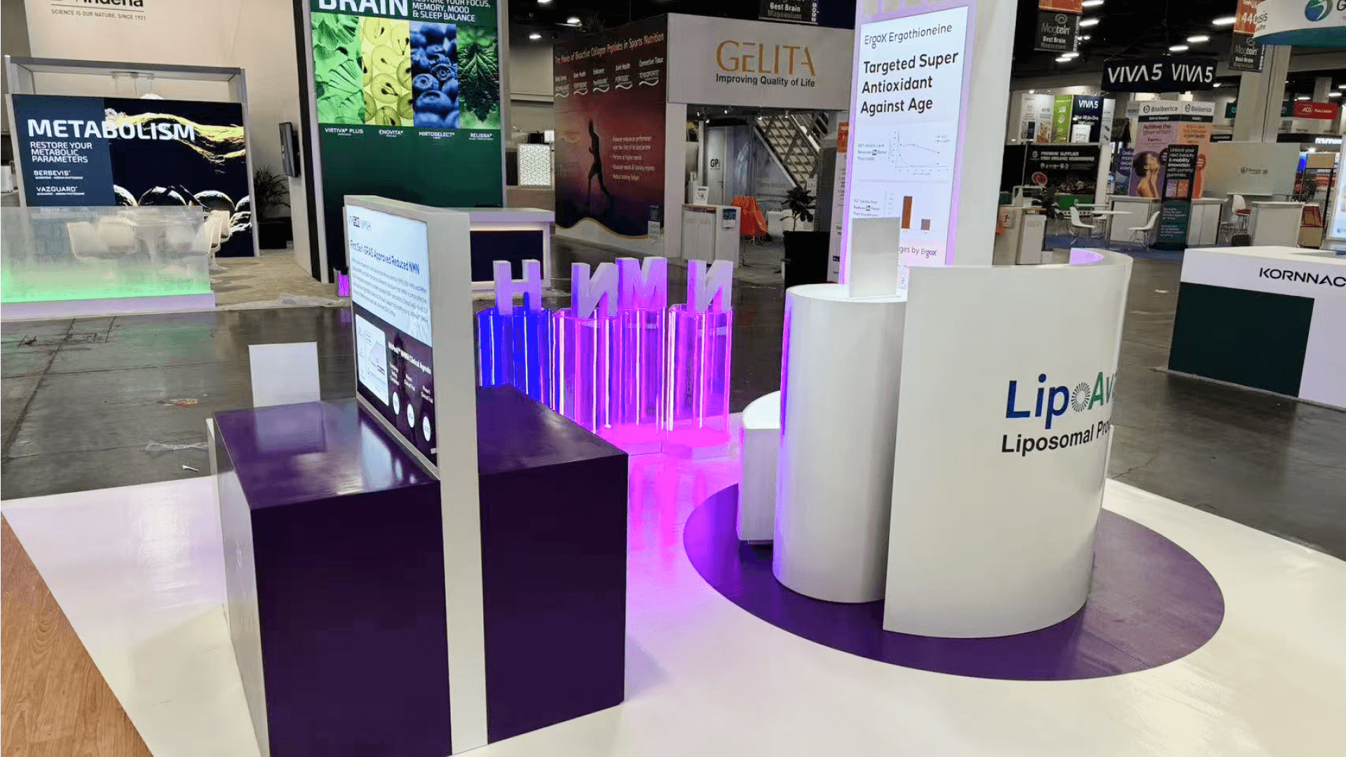 Custom-built optical industry trade show booth with consultation counter layout and controlled lighting for frame and lens evaluation