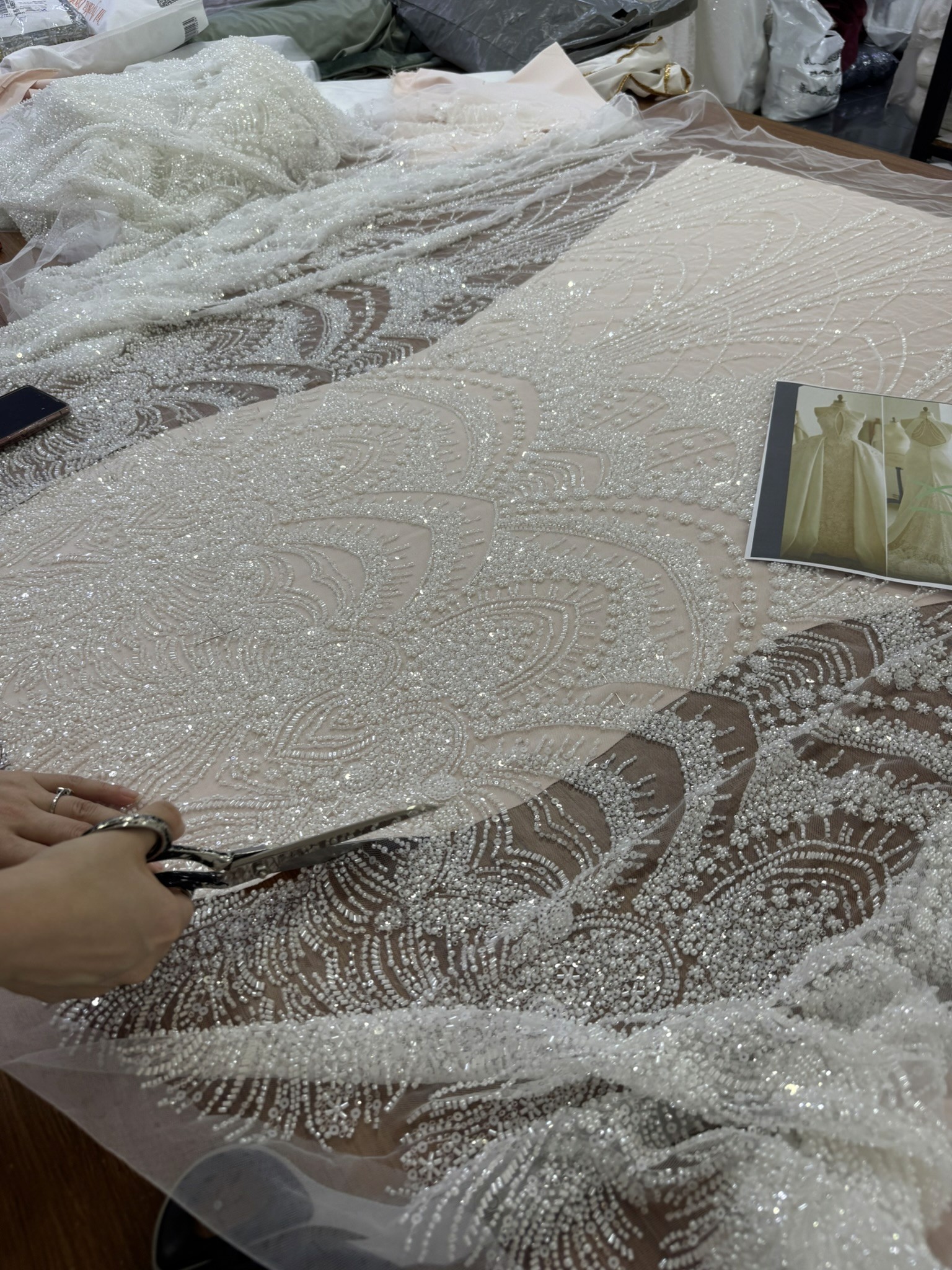 Beaded lace fabric and bridal reference photo for Lucidbride’s guided custom wedding dress process.