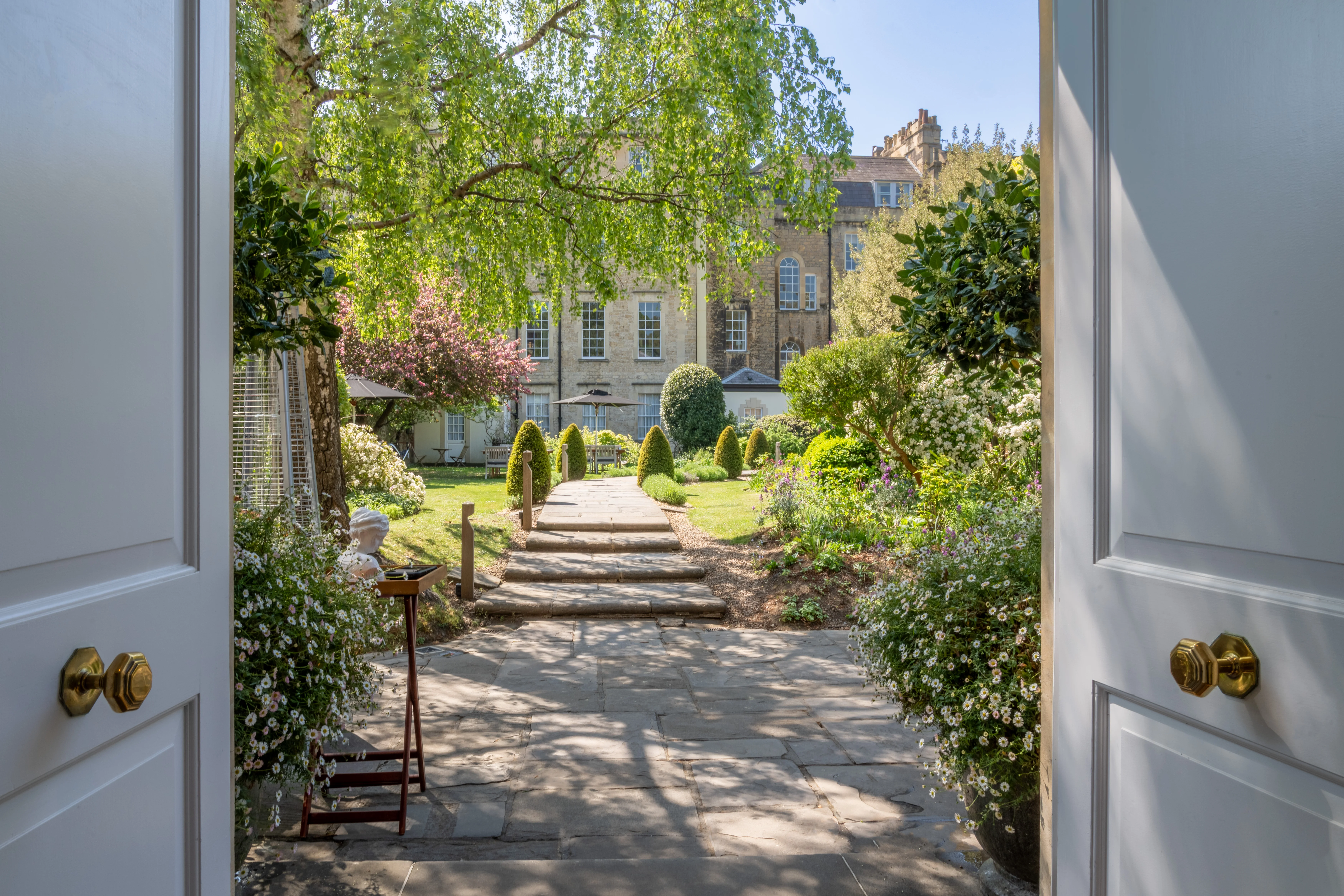 Framed garden view from hotel interior at Royal Crescent Hotel, Bath