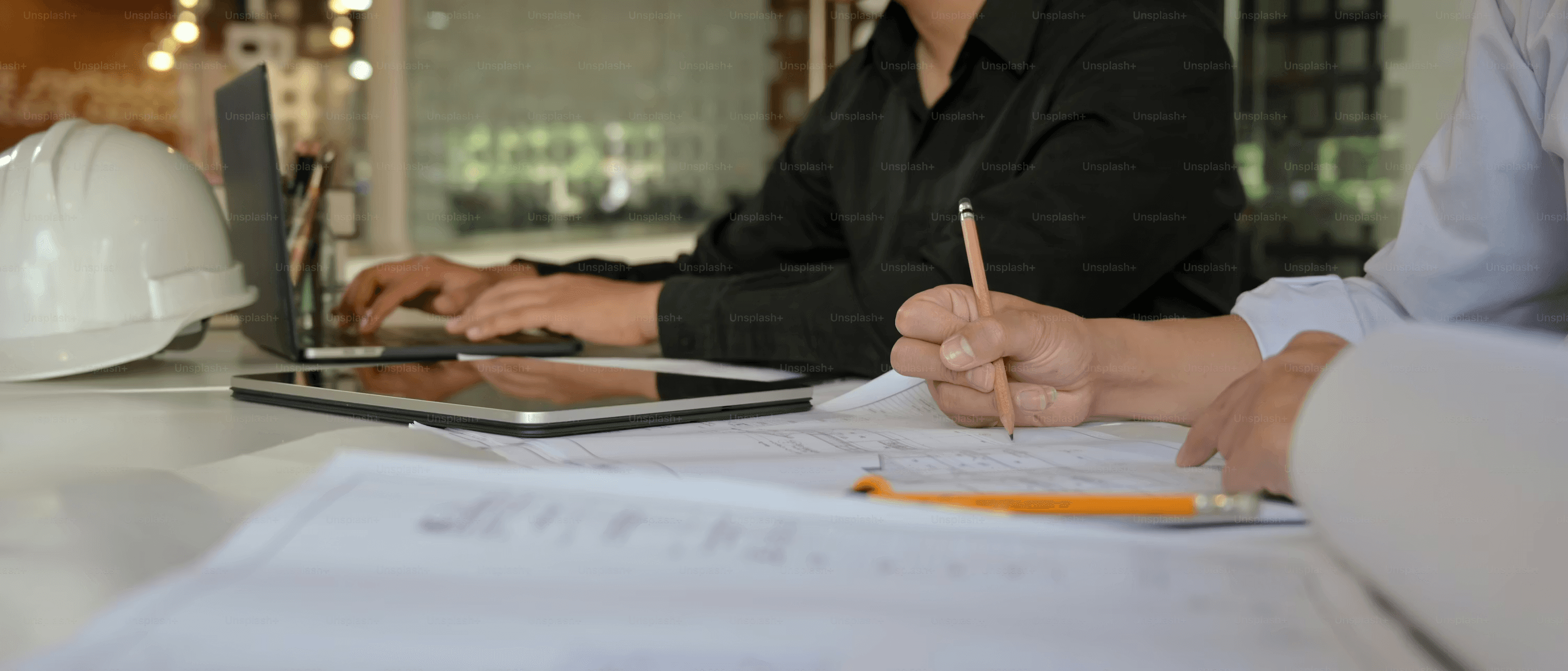 High school student writing a research methods section at a desk with academic journals and a laptop open to Google Scholar