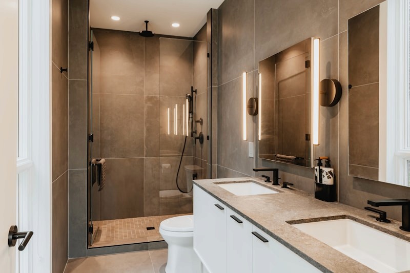 Finished bathroom tile work with shower and vanity