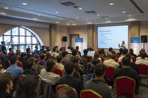 A cell phone sitting on top of a wooden table