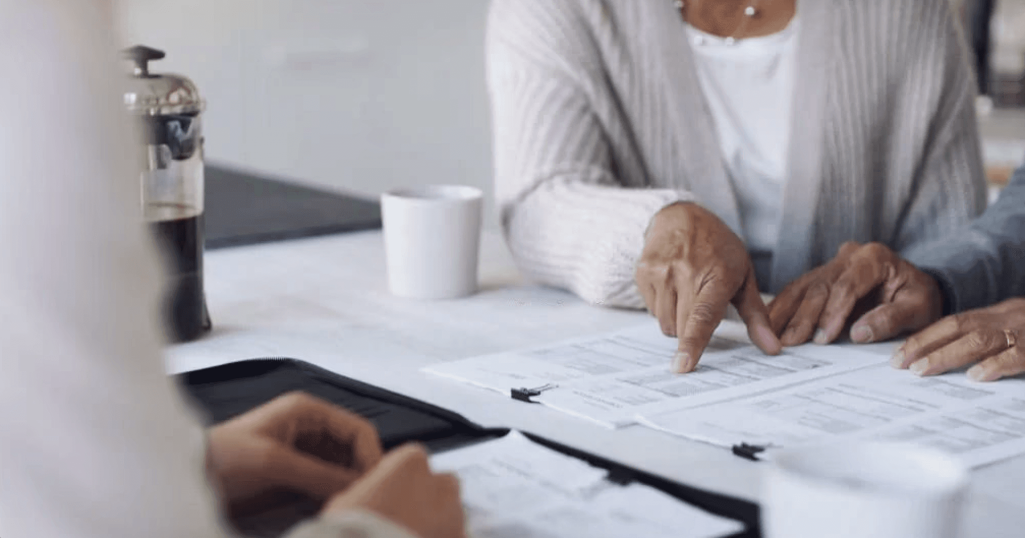 older man and woman reviewing documents