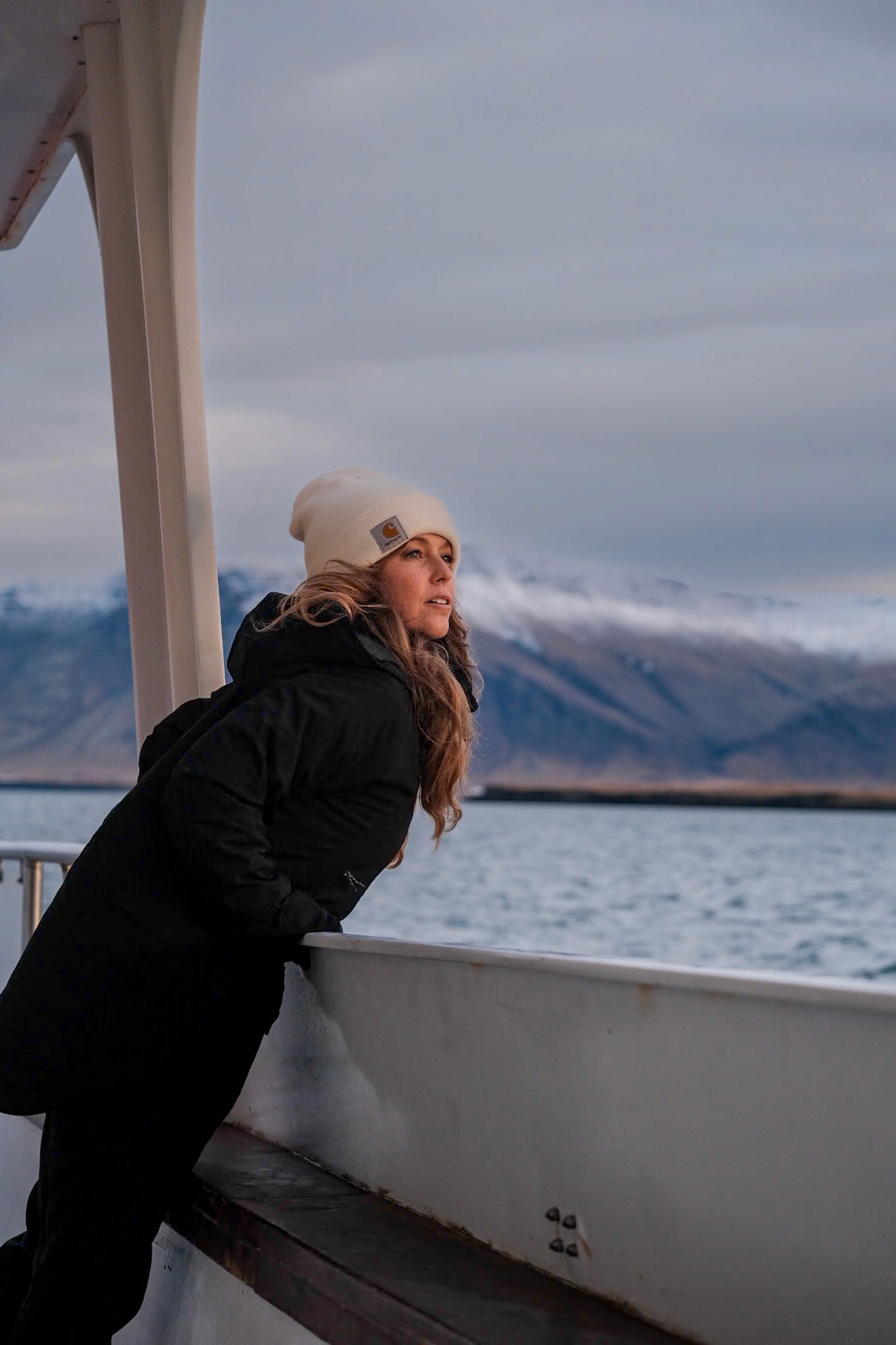 A man running along a forest path.