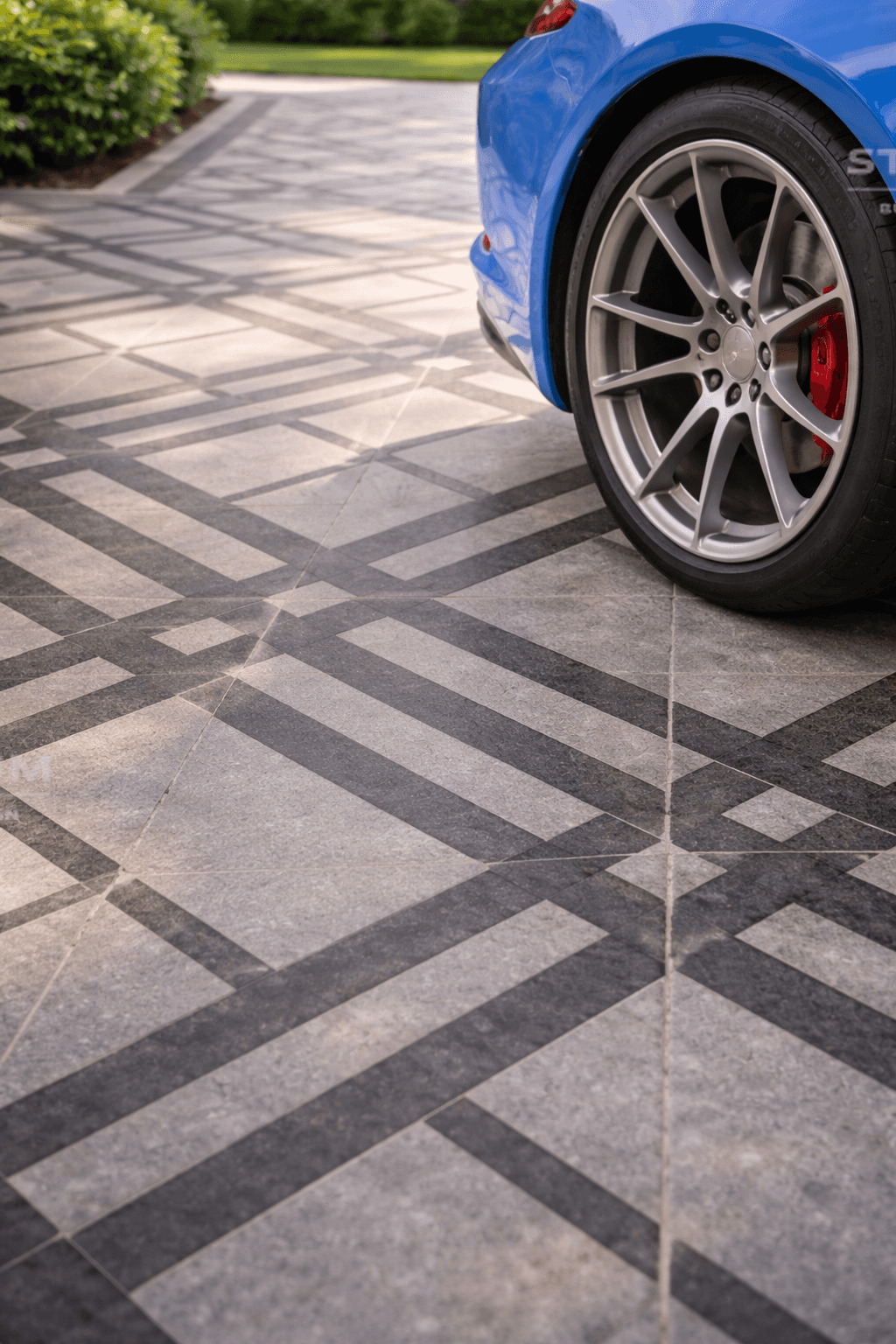 Close-up of Gazelle stone tile showing concentric curved line pattern and textured finish