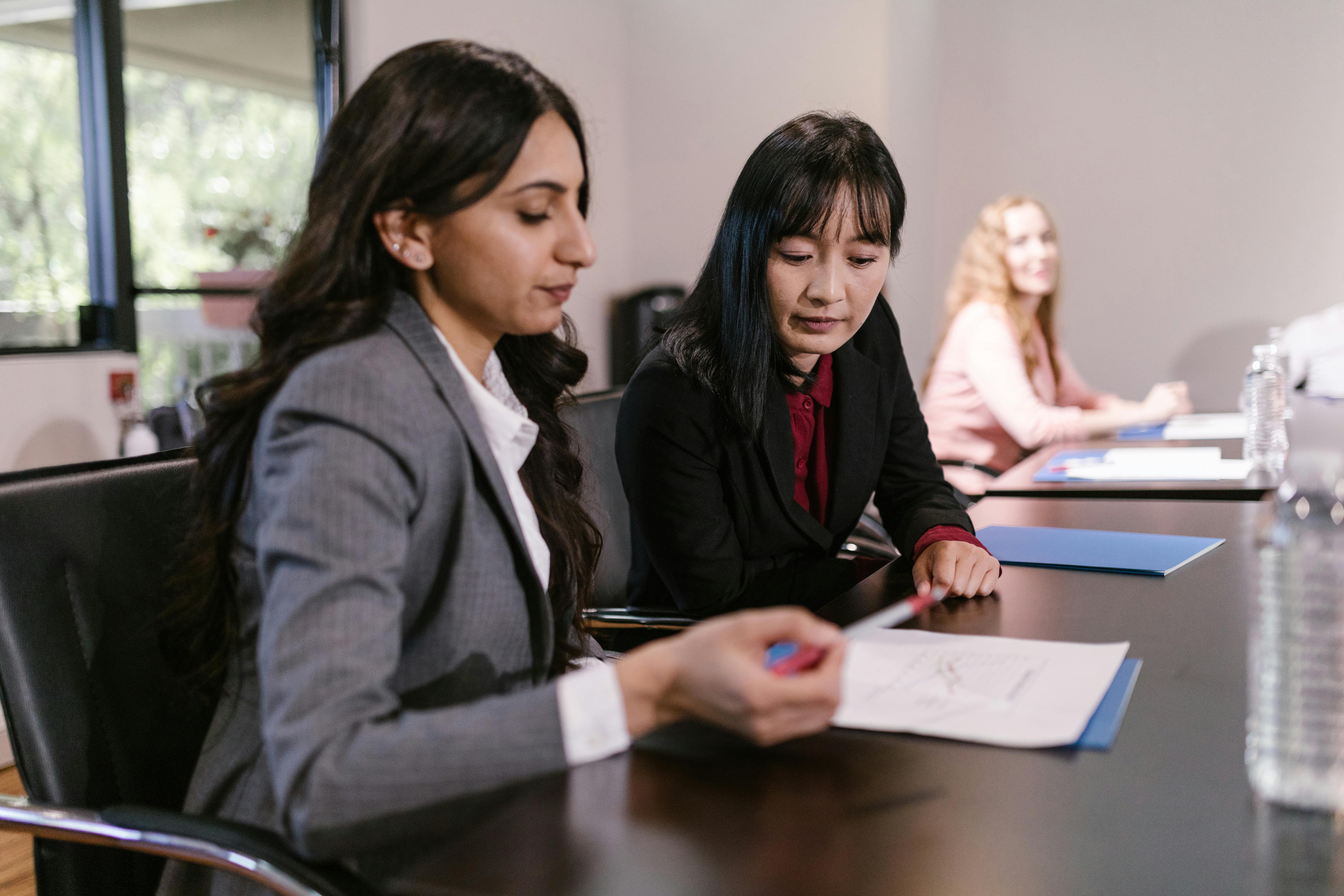 Advisor with a client in the meeting room