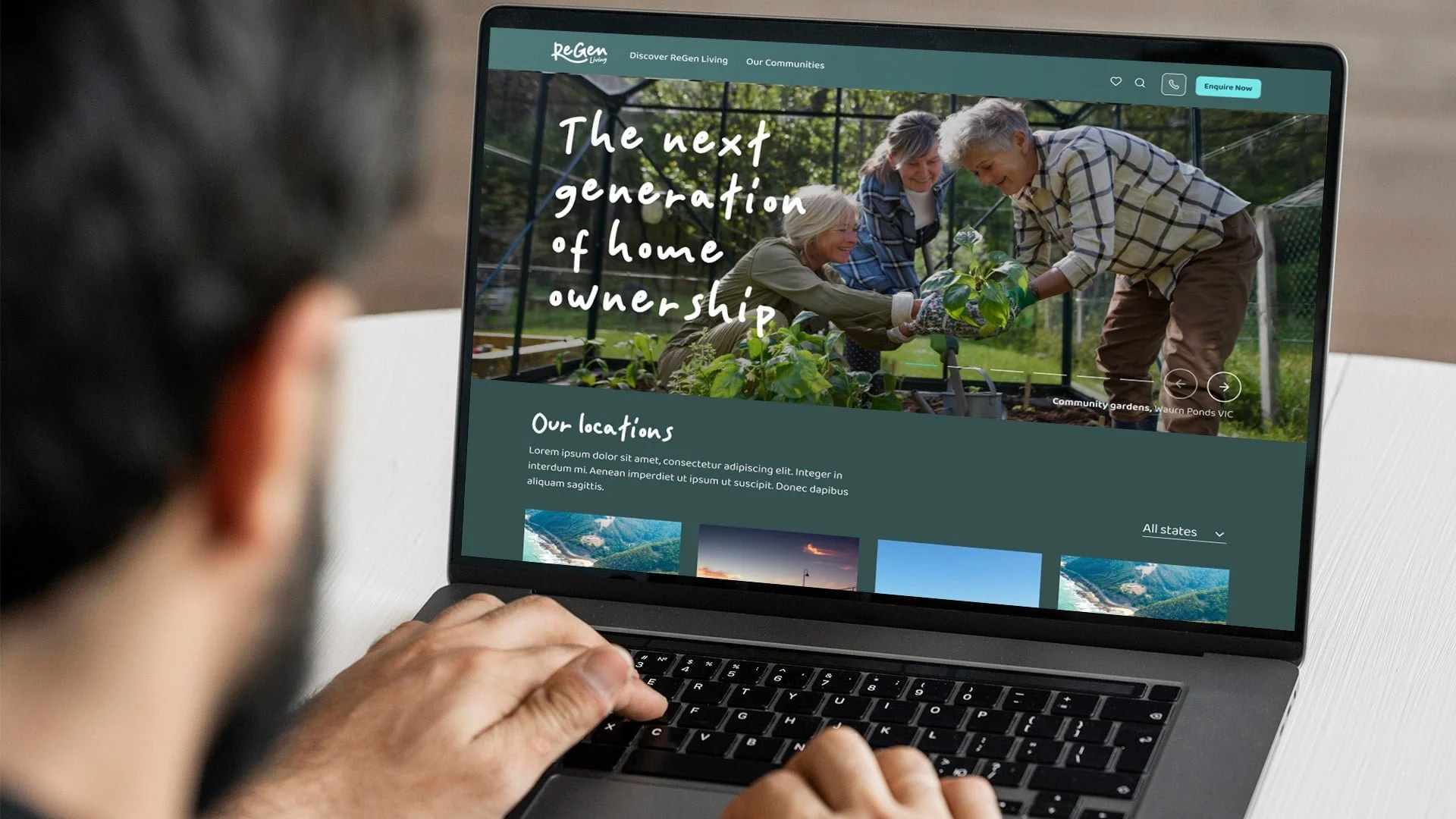 Man using a laptop showing the ReGen Living website, headline 'The next generation of home ownership' over gardeners
