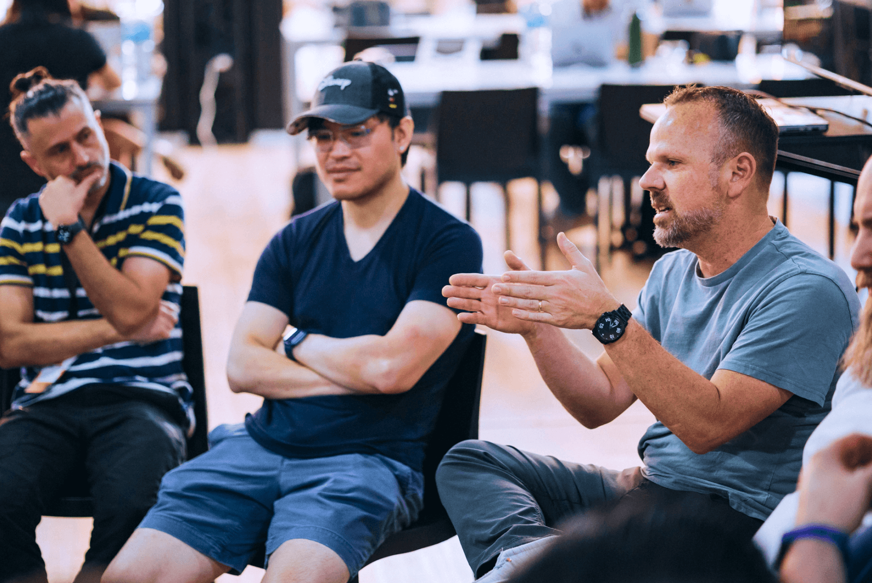 Photo of a Halo employees discussing a project