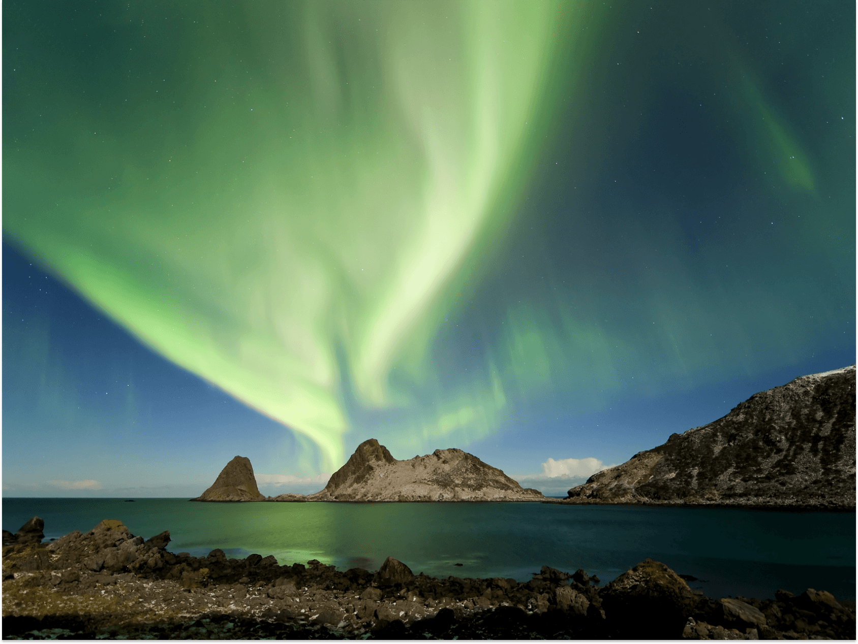 The Northern Lights above an island