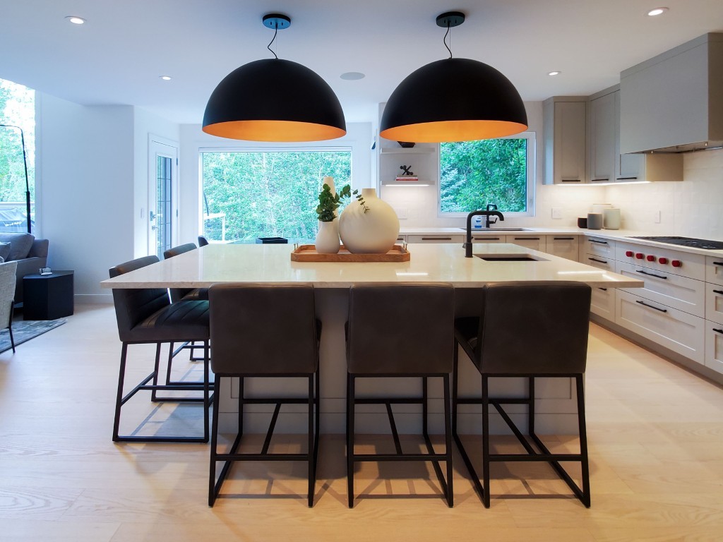 Image of Modern kitchen with island seating, pendant lights, and sleek design by KHD Homes interior design experts.