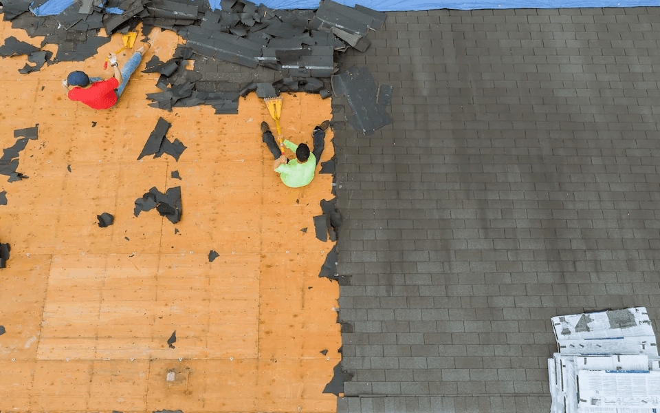 Expert local roofing contractors working on residential roof framing structural timber layout installation project