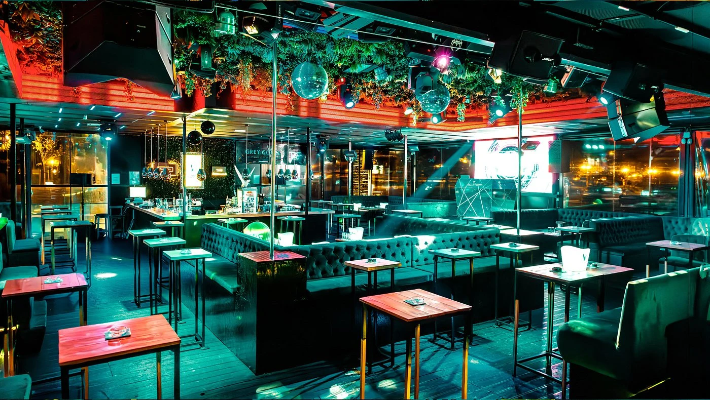 Splav Tag nightclub interior with dance floor and DJ stage, located in Belgrade, Serbia