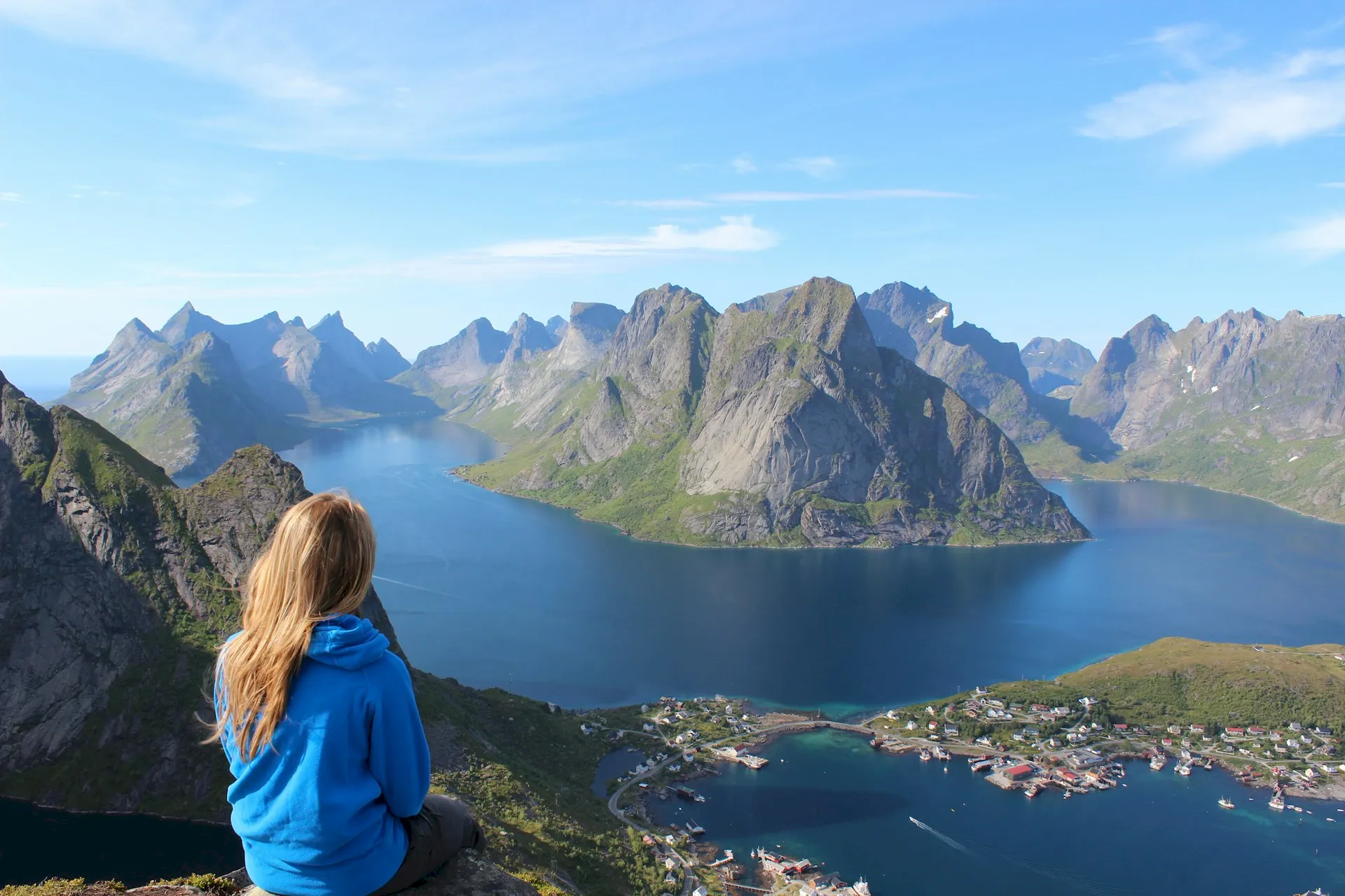 Woman looking over a beautiful mountainous lake