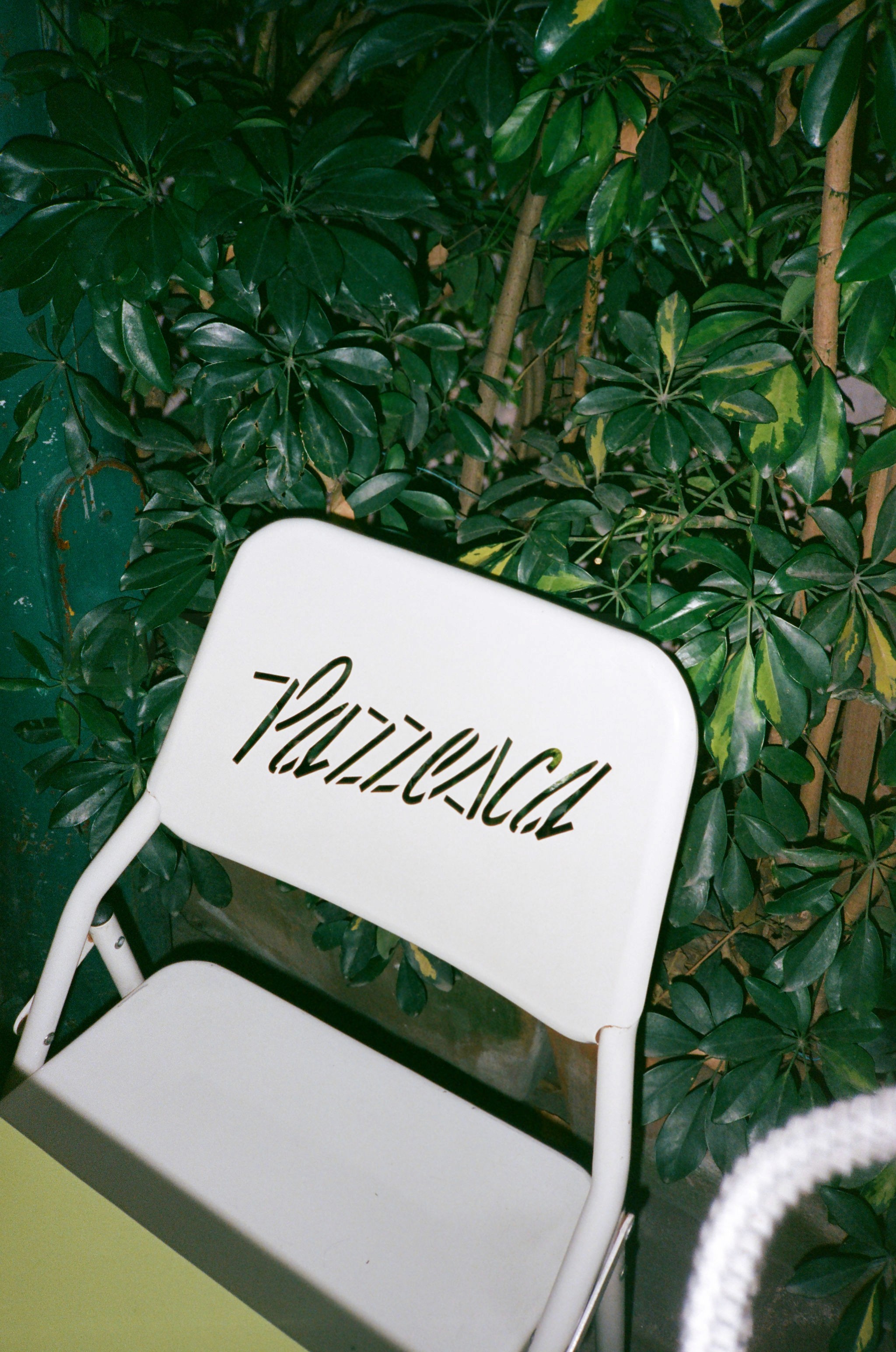 Woman with red hair covering mouth with hair