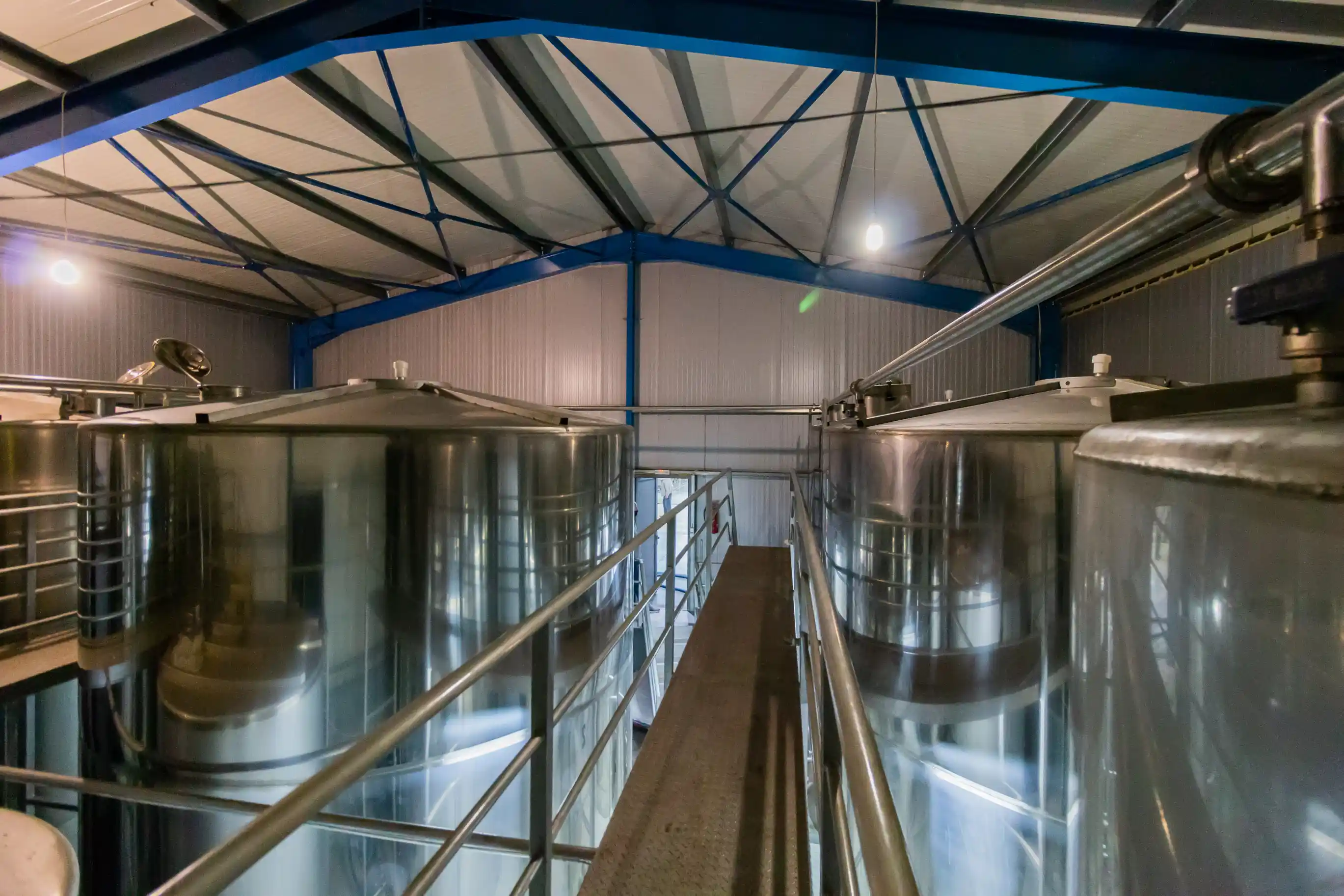 Stainless steel storage tanks for extra virgin olive oil at Fountas mill in Filiatra, Messenia.