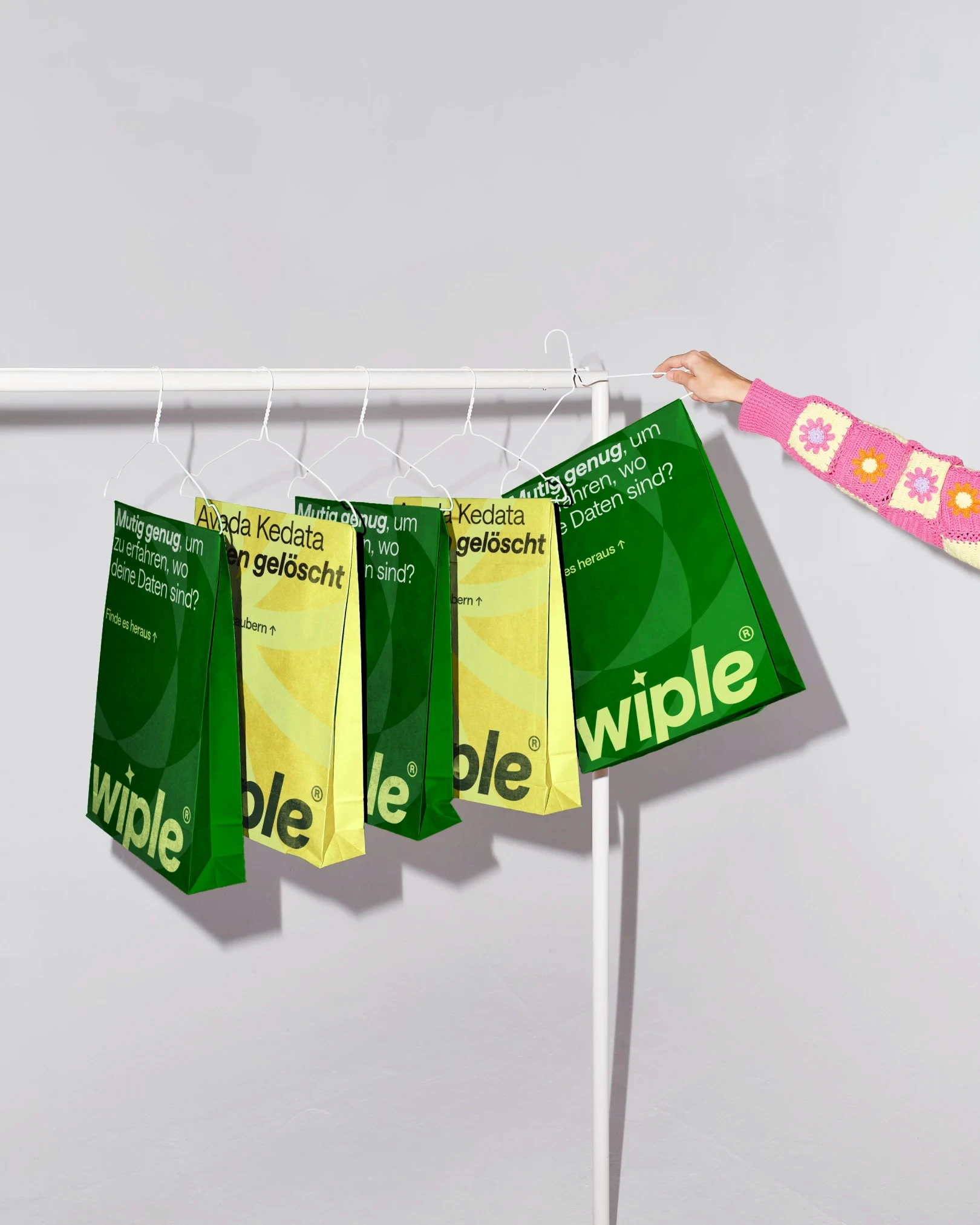 Paper bags on a clothes rail