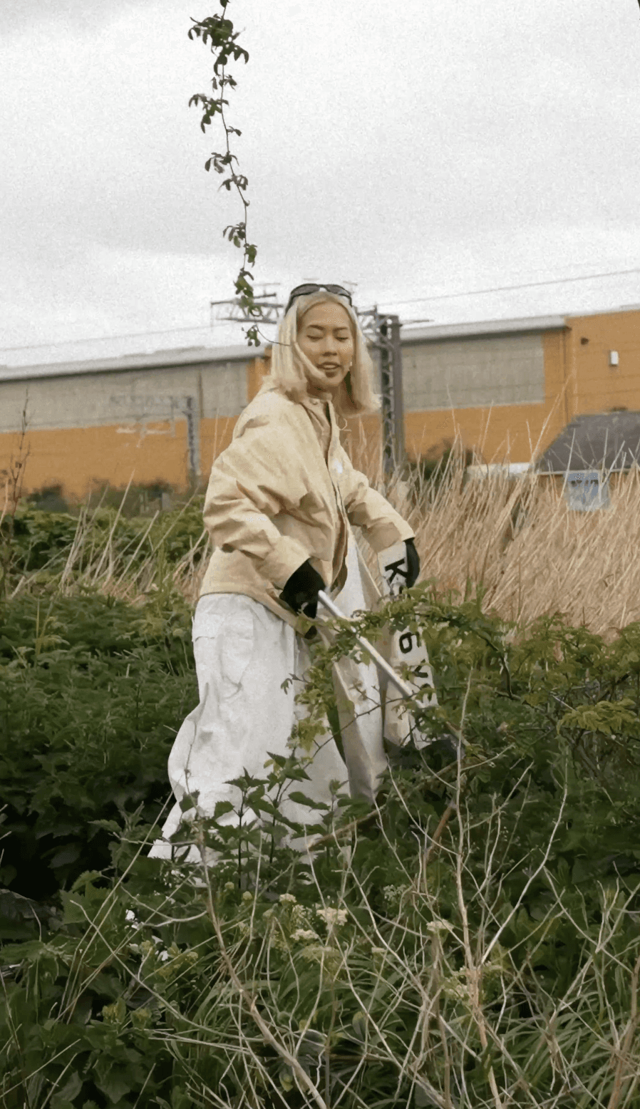 Bride and groom walking on street at night