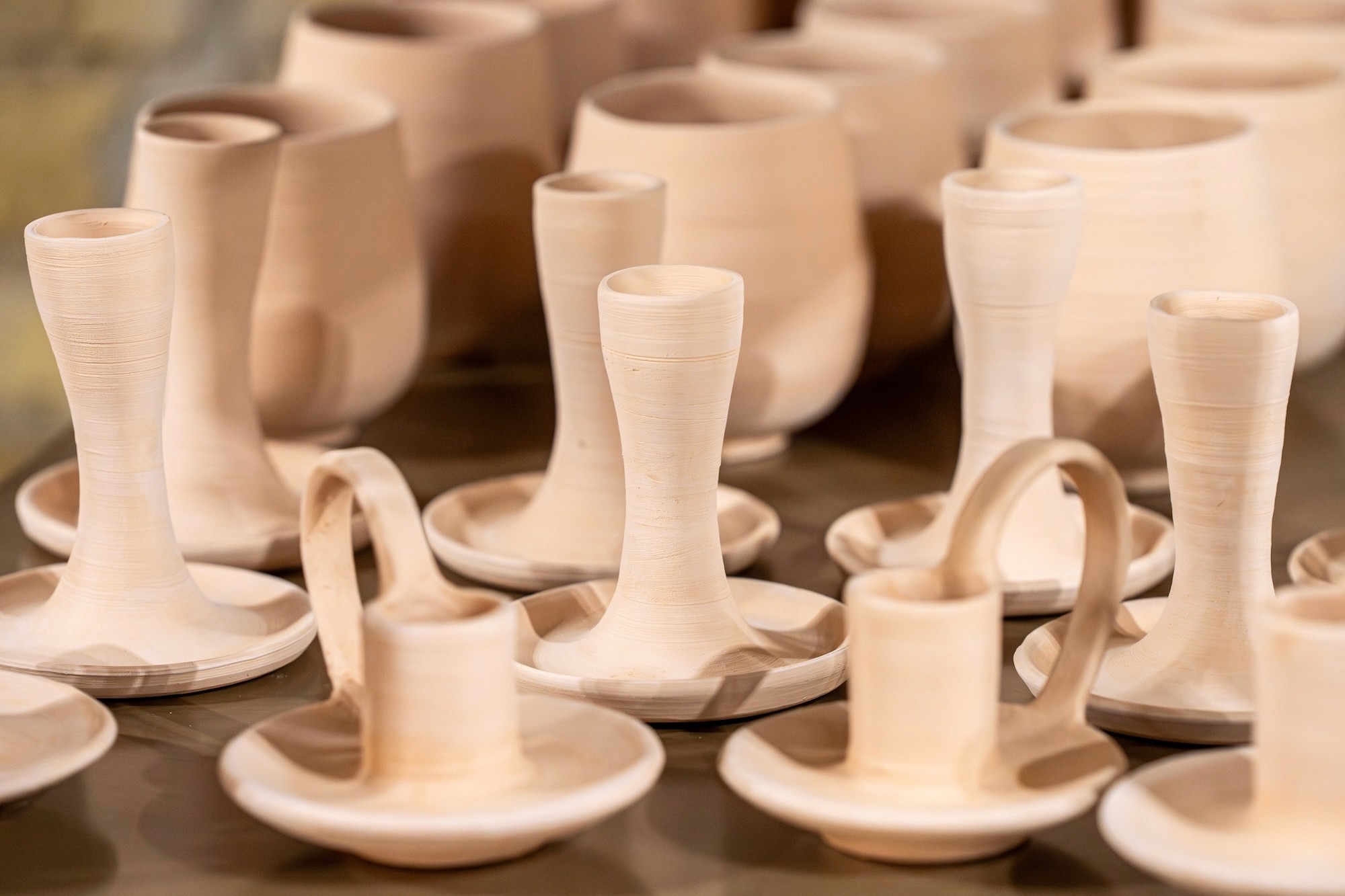 handmade bisqueware and candle holders ready to be decorated