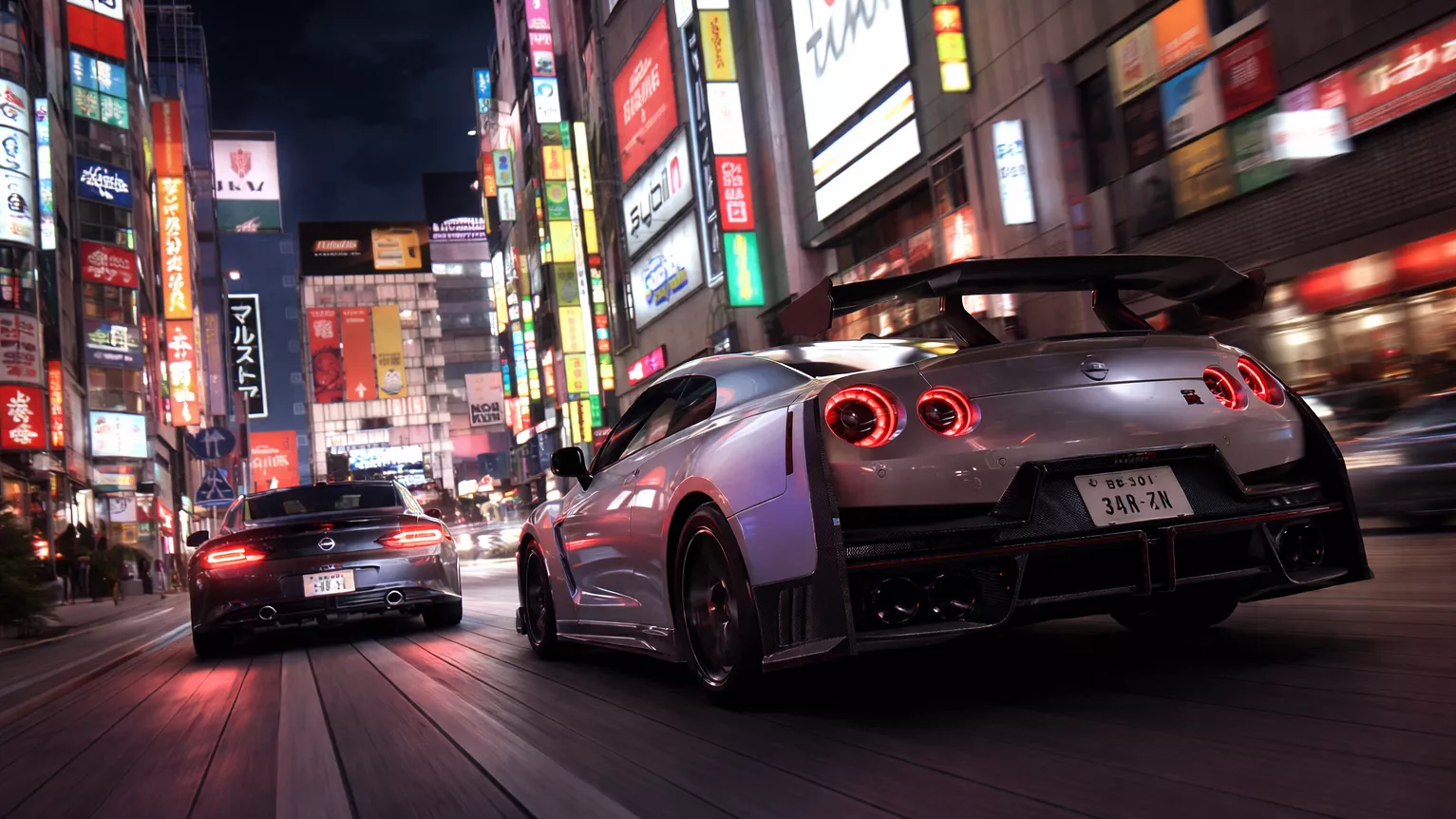 Forza Horizon 6 gameplay showing cars racing through Tokyo at night