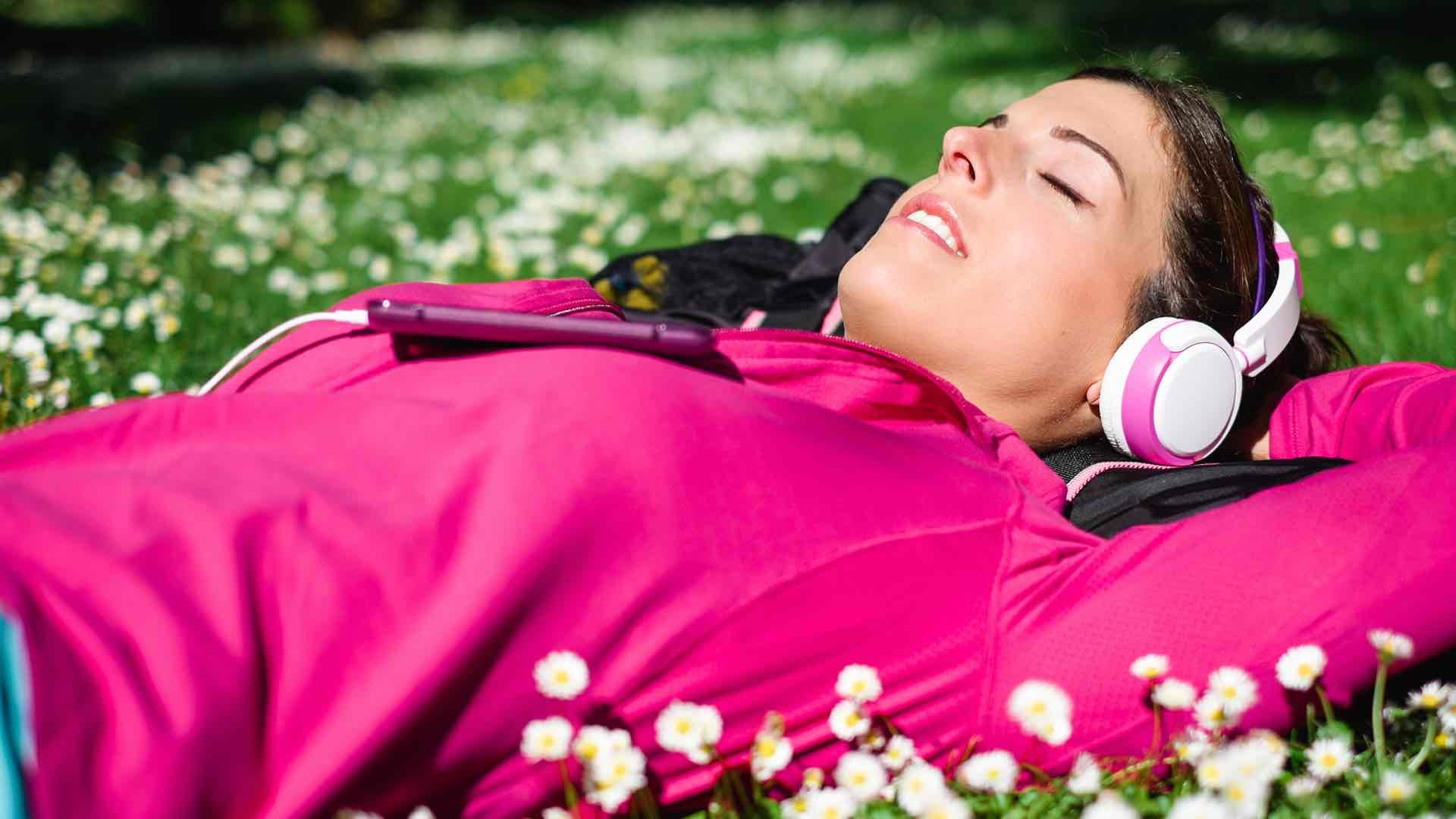 woman relaxing with headphones