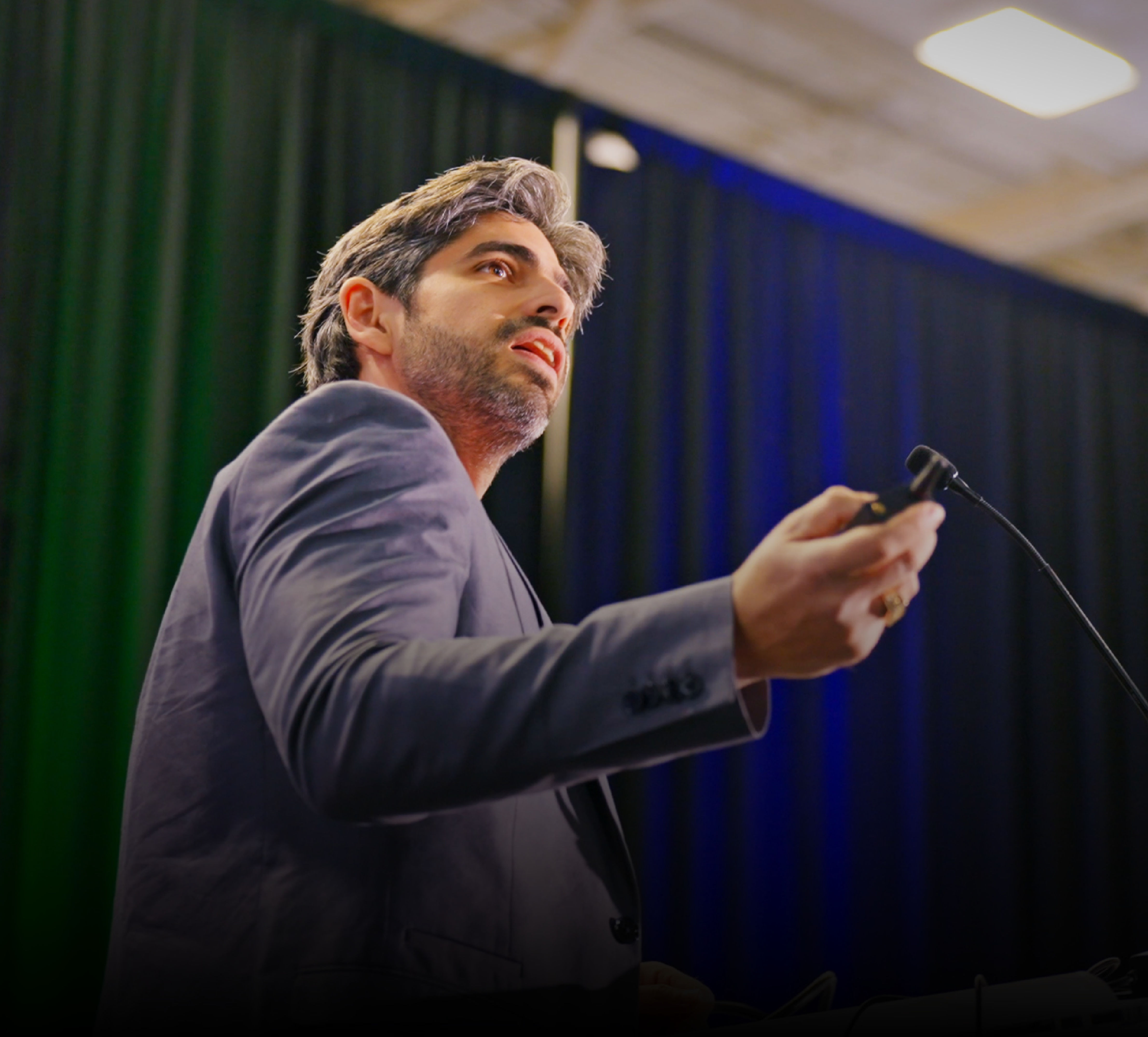 Artistic portrait with red and blue lighting creating a dramatic effect